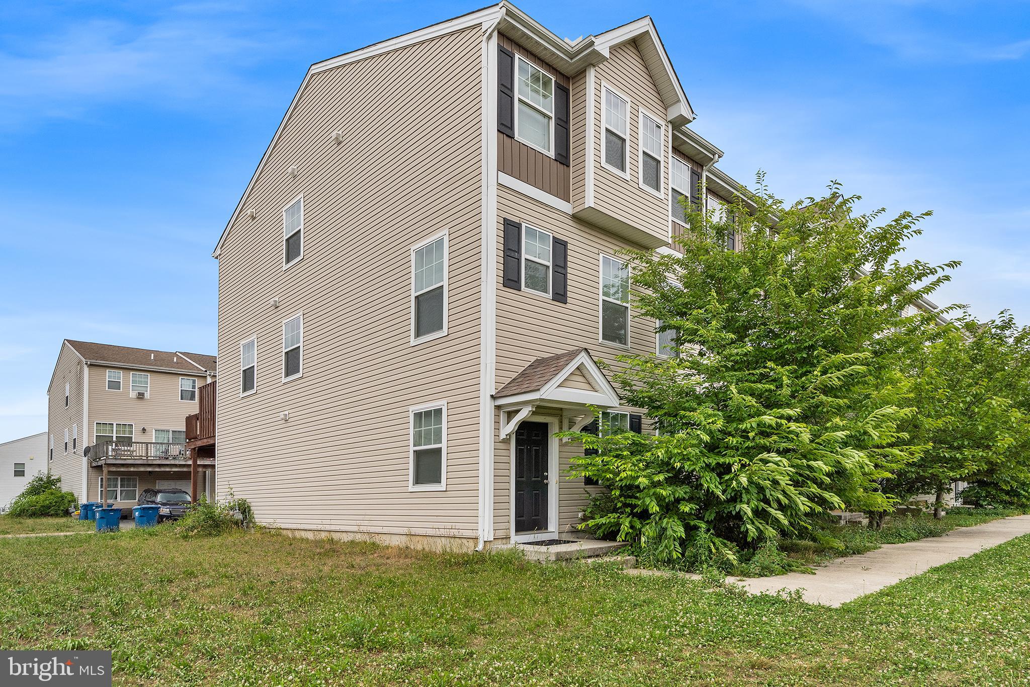 Don't miss this great end-unit townhouse in the desirable Tidbury Crossing community! With three living levels, there's plenty of space to meet a variety of needs. The main level features an extra large living room which is open to the updated Eat-In kitchen with an island and dining area, which features sliding doors leading out to the rear deck. The main living level is completed by a convenient half bath. The upper floor features three spacious bedrooms, including the large Primary Bedroom with a walk-in closet and ensuite full bathroom. The lower level serves as the entry to the home and offers a fourth bedroom or bonus room which could also serve as a home office, as well as another full bathroom. An attached two-car garage and driveway offers plenty of space for multiple vehicles. Don't miss this one! Mortgage savings may be available for buyers of this listing.