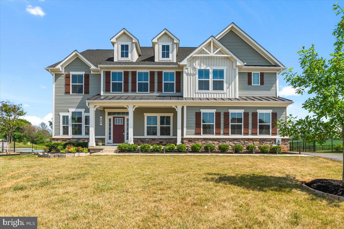 Welcome to this stunning 5-bedroom, 4.5-bath home in the desirable Spring View Estates community of Walkersville - where space, style, and small-town charm come together on an almost half acre lot! The main level impresses with soaring vaulted ceilings and a spacious open-concept layout featuring a gourmet kitchen with ample storage flowing into the living area, a main-level bedroom with a full bath - perfect for guests or multi-generational living - and a convenient half bath. Upstairs, the expansive primary suite offers a peaceful retreat with a private ensuite bath, joined by four additional generously sized bedrooms, two full baths, and an extra living space ideal for a playroom, study, or lounge. The unfinished basement offers a blank canvas ready to be transformed into additional living space, a home gym, media room, or whatever your heart desires. Step outside to a beautifully landscaped backyard with a patio added in 2022 - the perfect setting for outdoor entertaining and enjoying the generous lot with farm views. Nestled just 6 miles from Downtown Frederick, Walkersville offers access to Heritage Farm Park, Walkersville Community Park, Fountain Rock Park, and the beloved Walkersville Southern Railroad, all while providing easy access to I-15, I-270, and I-70 for effortless commuting in any direction. This one is a must-see - don't miss it!