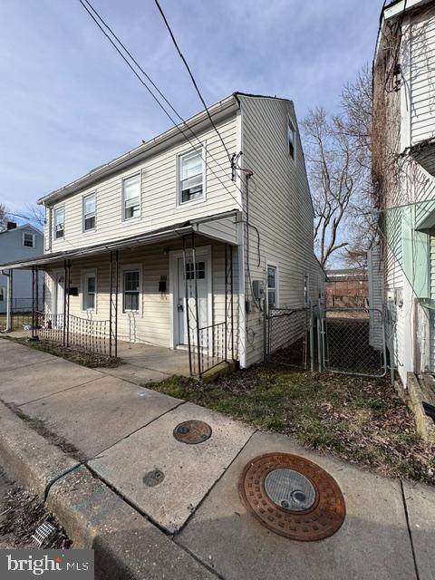 Occupied income producing duplex in downtown Elkton! 
Apt 119 is a studio apt within a year lease that rents for $950 per month.
Apt 121 is a 4 bed 1 bath apt within a year lease thats $1400 per month.