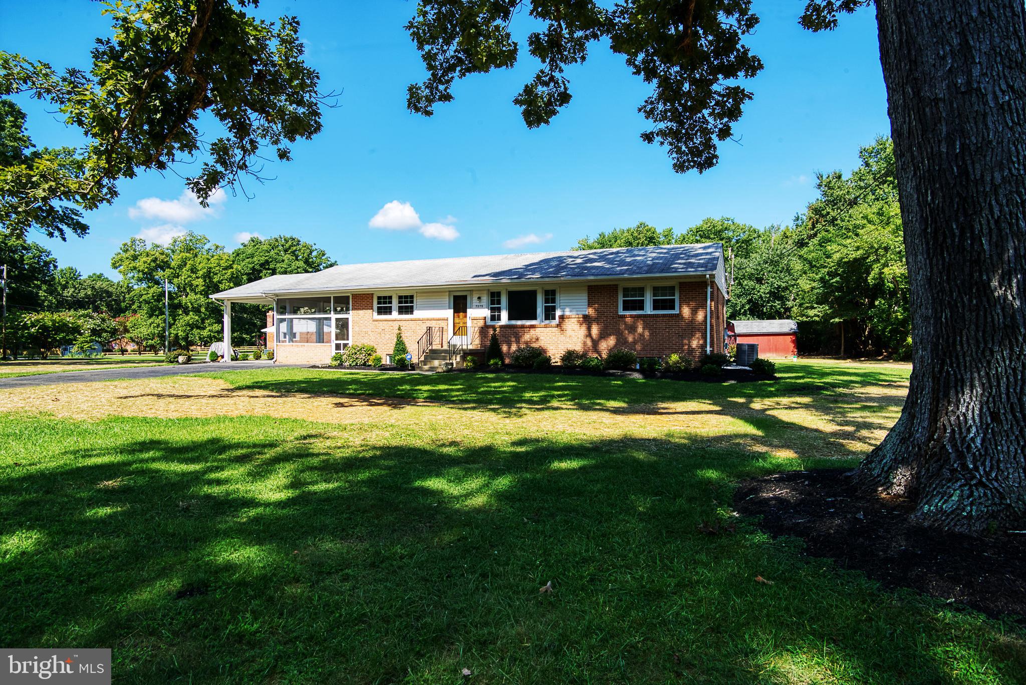 USDA FINANCING ELIGIBLE - MEANS NO MONEY DOWN!!  CLOSING ASSISTANCE OFFERED BY SELLER and/or ASK YOUR REALTOR ABOUT THE 2-1 Buy Down and lower your monthly mortgage payment!!  
That feeling you get when you gather at your Grandparents or your childhood home, this home will make you smile! Recently remodeled/renovated and beautifully finished ONE story w/finished basement.   Maintenance free back deck for that morning cup of coffee or tea, best time is from 6am to 1pm, before the afternoon sun comes around.  This recently remodeled/renovated and FRESHLY painted Rambler offers you warmth and inviting spaces, and MOVE IN READY!  The upper level with it's large living room, gorgeous kitchen w/recessed lighting, off-white cabinetry, granite counter tops, backsplash, hardwood floors, desirable and remodeled primary bath and second full bath. The spacious primary bedroom upstairs includes it's own private bathroom.  Total gut and remodel of the lower level/basement for all your entertaining needs w/a large family/great room for many uses from recreation room, game area, movie area, reading area, as well as two multi purpose rooms with windows & closets,  great for home offices, workout areas and so on, it's entirely up to you!  Just shy of an acre, level yard is perfect for outdoor enjoyment for sun and the shade.  Beautiful brick/stone patio for grilling and plenty of space under the carport that provides access to the screened in porch area for those relaxing evenings watching family and friends play outside, and also provides a great area for those family cookouts/BBQ's or eating crabs.  Located in the heart of La Plata, close to shopping and dining out.  BRAND NEW SEPTIC just installed in August 2022.  Must See this home to appreciate the space it offers, it has been taken care of and loved!!!