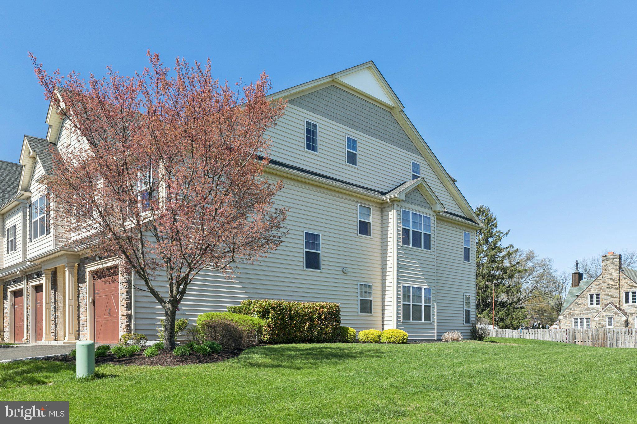 This is a rare chance to own an end-unit home in the quiet and green community of The Enclave in East Norriton.  This home is drenched in sunlight and feels like a single family house.  The main floor features a spacious living room with a gas fireplace, a separate dining area and an open kitchen with stainless steel appliances, granite countertops and an island for extra seating/meal prep.  This floor is complete with an ideally situated laundry room, 2 bedrooms and 2 full bathrooms...one being a primary suite.  The primary suite has vaulted ceilings, double closets with one being a large walk-in closet and a bathroom with a dual sink vanity.  The top floor has an en-suite which can be used as an in-law suite or home office/home gym/media room.  There’s more: 1-car garage, high ceilings, lots of windows with tons of natural sunlight, covered balcony with beautiful views, new water softener with reverse osmosis and plenty of parking.  Great location!  Easy access to 76, 476 and 202. Close to King of Prussia, Plymouth Meeting and Elmwood Park.