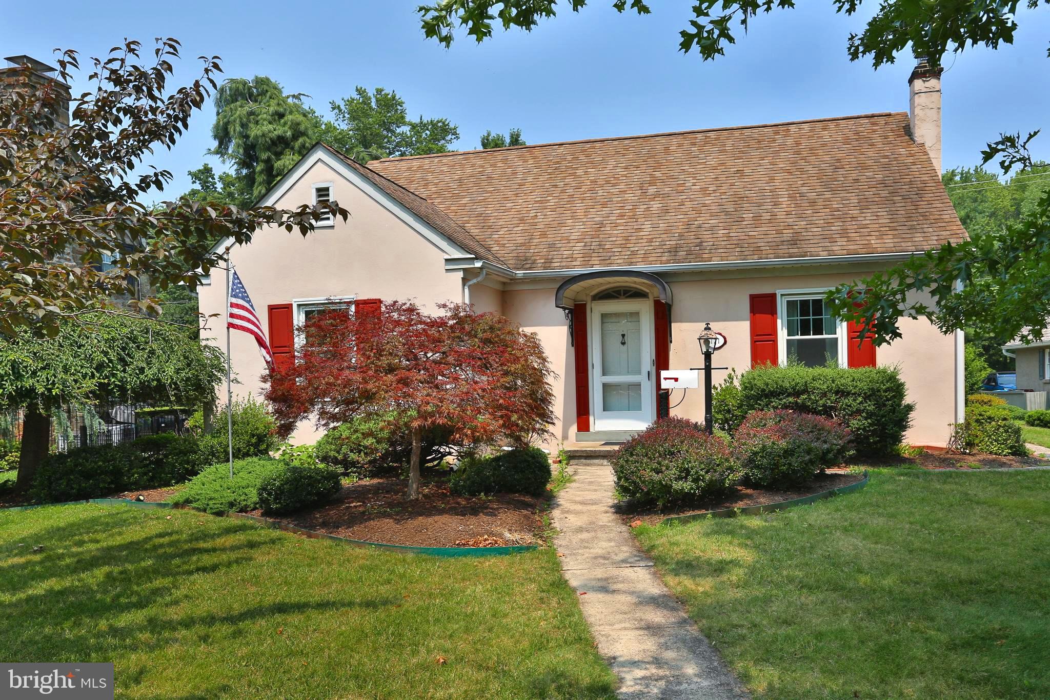 Nestled on a quiet, tree-lined street in one of Lansdale Borough's most desirable and established neighborhoods, this charming Cape Cod offers the perfect blend of classic character, thoughtful updates, and an unbeatable location within the award-winning North Penn School District. Situated on a beautifully landscaped 0.23-acre lot, this 4-bedroom, 2-full-bath home has been lovingly maintained by the same owner since 1982, reflecting true pride of ownership throughout every inch of the property. The sellers decades of care and attention are evident both inside and out, creating a home that has been cherished and meticulously cared for. From the moment you arrive, you'll be captivated by the inviting curb appeal, featuring mature trees, manicured landscaping, charming shutters, and a welcoming covered front entry. Adding even more value, all of the home's windows have been replaced, and a brand-new central air conditioning system will be installed prior to settlement, providing modern comfort and peace of mind. Step inside to discover beautiful hardwood floors flowing throughout much of the main level. The spacious living room is filled with natural light from oversized windows, creating a warm and inviting atmosphere for gathering with family and friends. The adjoining formal dining room is conveniently located just off the kitchen, making entertaining effortless while providing the perfect setting for holidays and special occasions. The kitchen offers ample cabinetry, generous counter space, and a breakfast bar overlooking the dining room. Just beyond, a bright enclosed breezeway serves as the perfect transition space to the attached one-car garage and backyard, offering endless possibilities as a mudroom, sitting area, or seasonal sun porch. The thoughtfully designed floor plan features two generously sized bedrooms and a full hall bathroom on the main level, offering the convenience of first-floor living. Upstairs, you'll find two additional spacious bedrooms, a second full bathroom, and excellent closet space, making it ideal for family, guests, or a home office. The full basement provides exceptional storage, workshop space, or the opportunity to create additional finished living space in the future. Bilco doors lead directly to the private rear yard, offering convenient outdoor access. Step outside to your own peaceful backyard retreat, where mature landscaping creates a private setting perfect for entertaining, gardening, or simply relaxing. The spacious yard offers plenty of room for outdoor activities while maintaining a tranquil feel that's hard to find. Conveniently located just minutes from downtown Lansdale's vibrant restaurants, local shops, parks, SEPTA Regional Rail, and major commuter routes, this home combines timeless Cape Cod charm with an exceptional location is a truly must see. Offering classic appeal, major updates, and unlimited potential, 121 Oak Drive is ready for its next owners to enjoy for years to come.