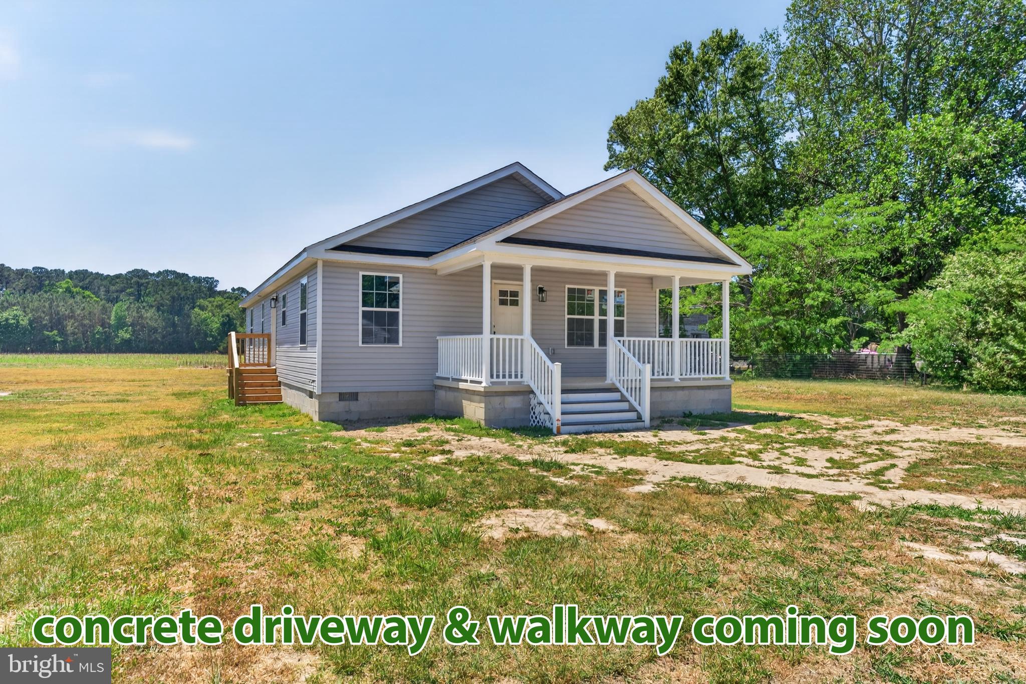 BRAND NEW - TURN-KEY 3BR/2BA ,1,400sf contemporary rancher on a large homesite - quality-built by local builders with many upgrades included - LVP flooring throughout, stainless steel kitchen appliance package, granite counters, upgraded cabinetry, ceiling fans in all bedrooms!   * * *  Location qualifies for 100% Financing! * * *   Great floorplan maximizes every square foot. Wide, welcoming front porch leads into the living room. Large living room opens into the dining room and kitchen. Bright + cheery kitchen with plenty of crisp, white cabinetry, granite countertops, roomy dining area. Primary bedroom with LVP flooring, ceiling fan, full, en-suite bathroom - double-sink vanity, gorgeous deep-blue cabinetry, tub/shower combo, linen closet. 2 additional bedrooms with ceiling fans and LVP flooring, and a 2nd full bath with tub/shower combo. Nice-size laundry room completes the home's interoir. Concrete driveway and walk to be installed. Minutes to Historic Downtown Pocomoke - a charming small town with rich history, art scene, charming shops, & unique restaurants on the banks of the Pocomoke River.  20mi to NASA Wallops Facility, 20mi to beloved Chincoteague Island, and the incredible wild horses and sandy Atlantic beaches of Assateague. Close to everything Worcester County has to offer - boating, world-class fishing, crabbing, wildlife estuaries, incredible state parks - a true paradise for nature lovers, photographers, boaters - anyone who wants to enjoy the more relaxed pace of the Eastern Shore. Just 2-3 hours to major metro areas - Virginia Beach/Norfolk, Washington DC, Baltimore, Philadelphia, NYC. Life in Worcester County is good - from the beaches to the bays & beyond! Sizes, taxes, distances are approximate.