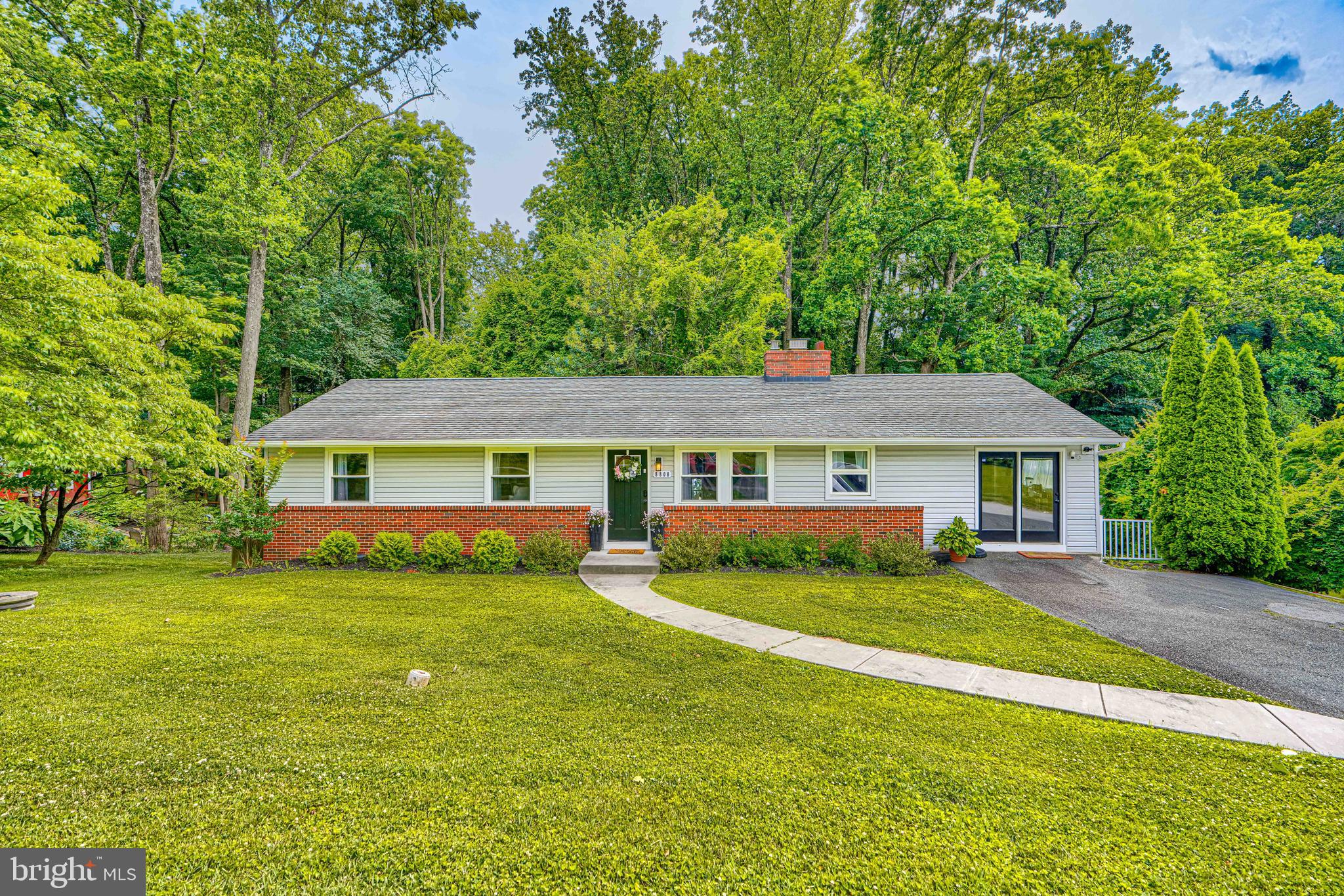COMPLETELY RENOVATED AND MOVE-IN READY! This stunning 5-bedroom, 3-bath home offers 2,304 square feet of beautifully updated living space on a rare 0.46-acre lot in Parkville.

Step inside to discover a bright, open floor plan featuring modern finishes throughout, spacious living and dining areas, and an updated kitchen designed for both everyday living and entertaining. The flexible layout provides five generously sized bedrooms and three full bathrooms, offering plenty of space for family, guests, a home office, or multigenerational living.

The fully finished basement expands your living space with endless possibilities for a recreation room, media room, fitness area, playroom, or guest suite. Outside, enjoy nearly half an acre of level yard space—perfect for entertaining, gardening, pets, or future outdoor enhancements.

Ideally located near shopping, dining, parks, schools, and major commuter routes, this turnkey home combines modern updates, exceptional space, and outstanding value.

Opportunities like this don't come along often. A fully renovated 5-bedroom, 3-bath home with a finished basement and nearly half an acre is a rare find. Schedule your private showing today before this one is gone!