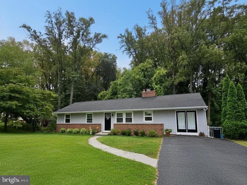 COMPLETELY RENOVATED AND MOVE-IN READY! This stunning 5-bedroom, 3-bath home offers 2,304 square feet of beautifully updated living space on a rare 0.46-acre lot in Parkville.

Step inside to discover a bright, open floor plan featuring modern finishes throughout, spacious living and dining areas, and an updated kitchen designed for both everyday living and entertaining. The flexible layout provides five generously sized bedrooms and three full bathrooms, offering plenty of space for family, guests, a home office, or multigenerational living.

The fully finished basement expands your living space with endless possibilities for a recreation room, media room, fitness area, playroom, or guest suite. Outside, enjoy nearly half an acre of level yard space—perfect for entertaining, gardening, pets, or future outdoor enhancements.

Ideally located near shopping, dining, parks, schools, and major commuter routes, this turnkey home combines modern updates, exceptional space, and outstanding value.

Opportunities like this don't come along often. A fully renovated 5-bedroom, 3-bath home with a finished basement and nearly half an acre is a rare find. Schedule your private showing today before this one is gone!