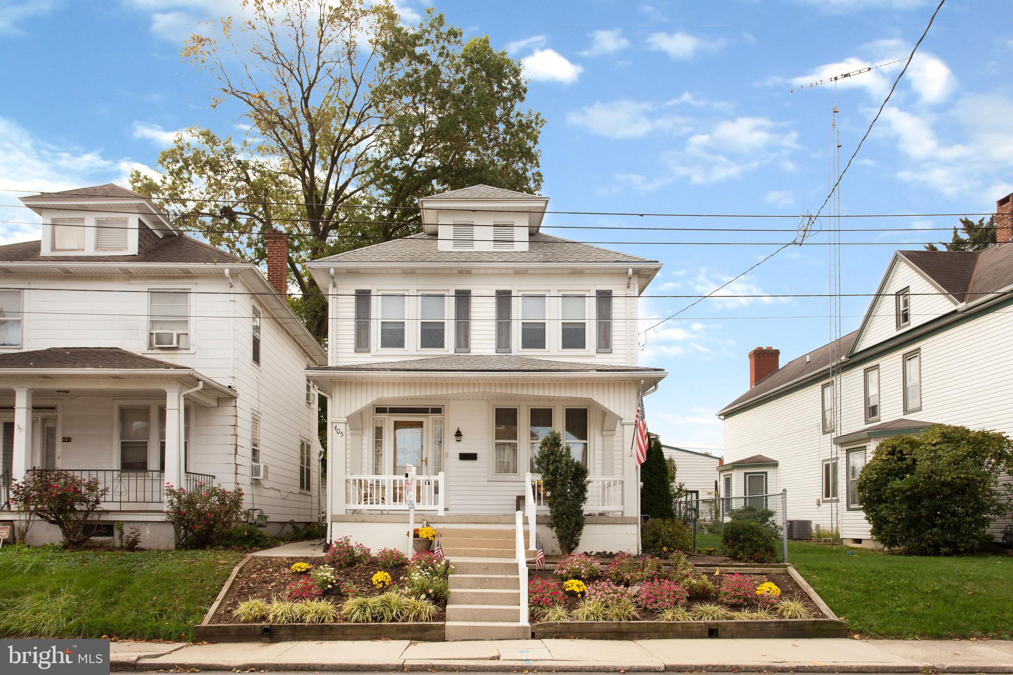 Incredible 2½ story Colonial home in great location central to most any travel and necessities, 4 bedrooms, 1½ baths, beautiful Chestnut wood work, 2 sets of French doors, open stairway.  This place really feels like home.  Formal dining with bay window, eat in kitchen, 5’6” x 11’6” sunroom, 16’6” x 10’ mostly covered deck and a fenced in rear yard leading to an oversized 24’ x 24’ detached garage with paved rear alley access and automatic door openers.  This amazing home has all vinyl siding and is mostly maintenance free.  The covered front porch is 7’ x 18’ with a concrete floor and vinyl safety railings.  The high-quality custom kitchen was installed by Style--Line Cabinets “Robert Baum” it includes: Raised panel doors on high cabinets with adj. shelving, pull out shelves with European hinges, low voltage under cabinet lighting.  The home is heated by a Slant Fin natural gas hot water boiler with 2 zone heat.  The central air unit is a Bryant unit.  There is a 2nd floor balcony 5’6” x 10’ that overlooks the manicured landscaped yard.  The A.O. Smith natural gas hot water heater was installed in 2022.  The 2nd level of the home has thermo tilt in windows and the electric system is a Square D 100-amp circuit box.  Included in the sale of this home: Refrigerator, electric range/oven, built in dishwasher, electric dryer, washer, all Blinds, 2nd Floor bathroom was recently tiled, and a new shower head installed.