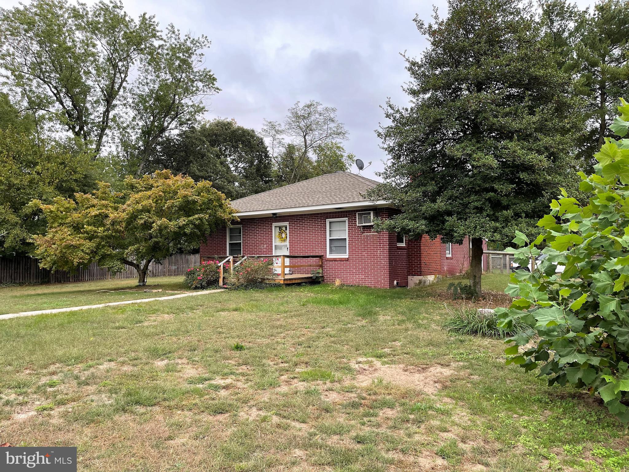 The simple pleasures of one level living, low maintenance all brick home on large corner lot, 2 bedrooms, 1 bath, eat-in kitchen with granite countertops, living room with fireplace and laundry room/pantry.  Other highlights of the home include hardwood floors, instant hot water, 1 car garage, full unfinished basement, breezeway and fenced yard.... New septic system May 2020 and the roof is only 4 years old...Just one block to Chester River/boat ramp and minutes to Rt. 301