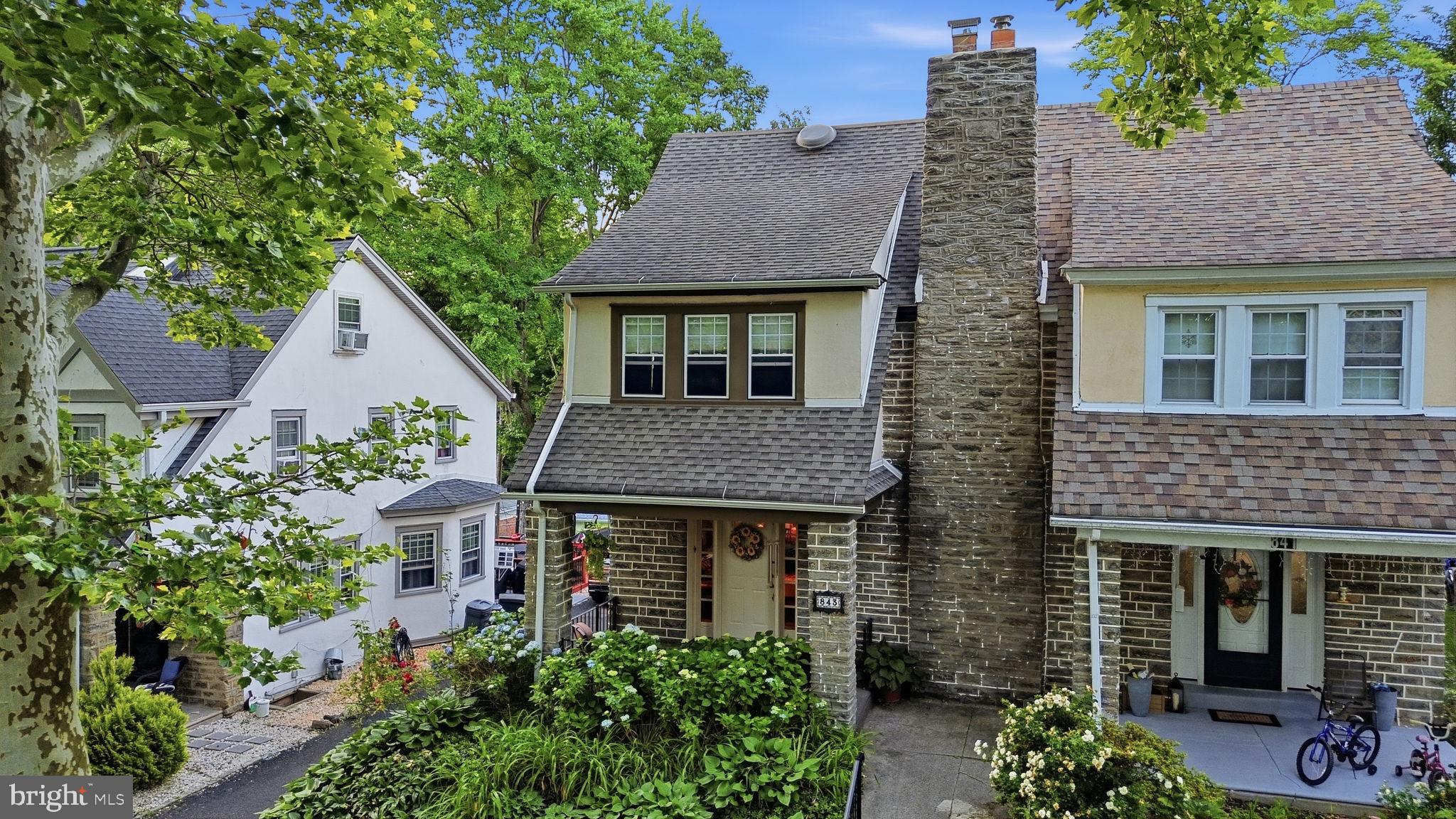 **Open House Sunday, 1-3pm *** 843 Elkins Avenue is a charming Tudor-style twin that blends classic character with the thoughtful updates and extra space you're looking for. Filled with natural light and featuring hardwood floors throughout much of the main level, this home offers a warm and inviting atmosphere from the moment you step inside.

The updated kitchen opens to the dining room, creating an ideal layout for everyday living and entertaining. One of the home's standout features is the rear addition, a rare enhancement for homes of this style, which provides a spacious family room along with the convenience of a first-floor powder room and laundry area. The family room leads to a low-maintenance composite deck overlooking the patio and backyard, creating the perfect setting for outdoor dining, relaxing, or gathering with friends and family.

The second floor offers three comfortable bedrooms and a full hall bath, while the third floor provides exceptional flexibility with a fourth bedroom featuring its own en-suite bathroom, making it an ideal primary suite, guest retreat, home office, or private space for extended family. 
The covered front porch extends the living space outdoors and offers a comfortable place to relax while enjoying the neighborhood's charm and activity.

Additional features include an unfinished basement and detached garage that both offer abundant storage. Beyond the home itself, you'll love the location on a friendly, close-knit street where neighbors gather and Halloween is always a memorable event. Parks, shopping, library, restaurants, and everyday conveniences are all nearby, while the SEPTA Regional Rail station provides easy access to Center City and the airport. Combining character, space, convenience, and community, this is a rare opportunity to own a home that truly offers the best of Cheltenham Township living.