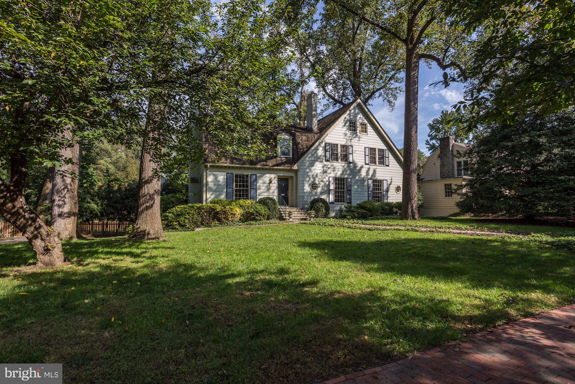 1918 home on prime corner in heart of West Village! Light-filled w/4700+ sf. Extremely generous room sizes including fab living room w/floor to clg windows, dining room w/beamed clg&fp,wonderful library&large enclosed sunroom off renov kit main level.Hard to find 5 big BRs on 2nd lev.Lower lev rec rm w/kitchenette,in-law&att 2 car gar. Back staircase.Beautiful big lot.Walk metro&shops.Rare find!