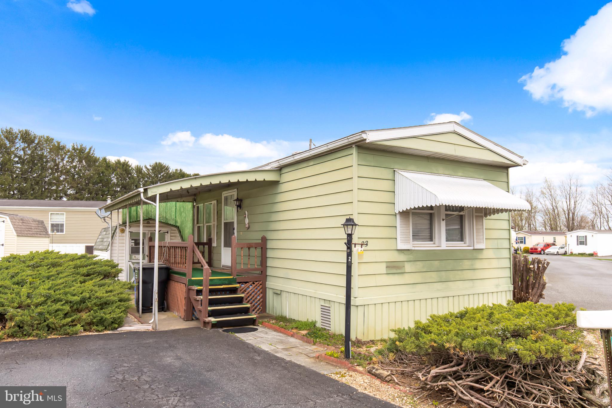 Affordable living in Triple J Mobile Home Park - 55+ Gem!
This cozy well-loved single-wide is packed with charm, comfort and opportunity! This 2 bedroom, 1 bath mobile is move-in ready and waiting for you to call home. Central air to keep you cool all summer long, freshly filled & serviced propane take, spacious eat-in/country kitchen, relaxing covered deck for enjoying peaceful sunsets. Nestled in a quiet rural setting, just minutes from Lancaster County's favorite attractions, shopping, and everything you need - this home gives you the best of both worlds: peaceful living w/ convenience right around the corner! Washer, dryer, refrigerator included. Two private parking spaces for your convenience.