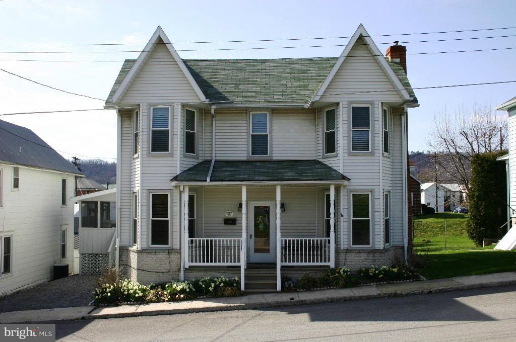 Make this 4 BD, 2 BA Victorian your new home. Over 2000 sq. ft of living space. Spacious rooms. Pellet stove in family room. Great 14x13 screened porch for relaxing/entertaining. Floored attic for extra storage. Nice back yard with storage shed. Short distance to shopping and dining. Move in ready. Just bring your suitcases and personal treasures. Five window A/C units convey with sale.