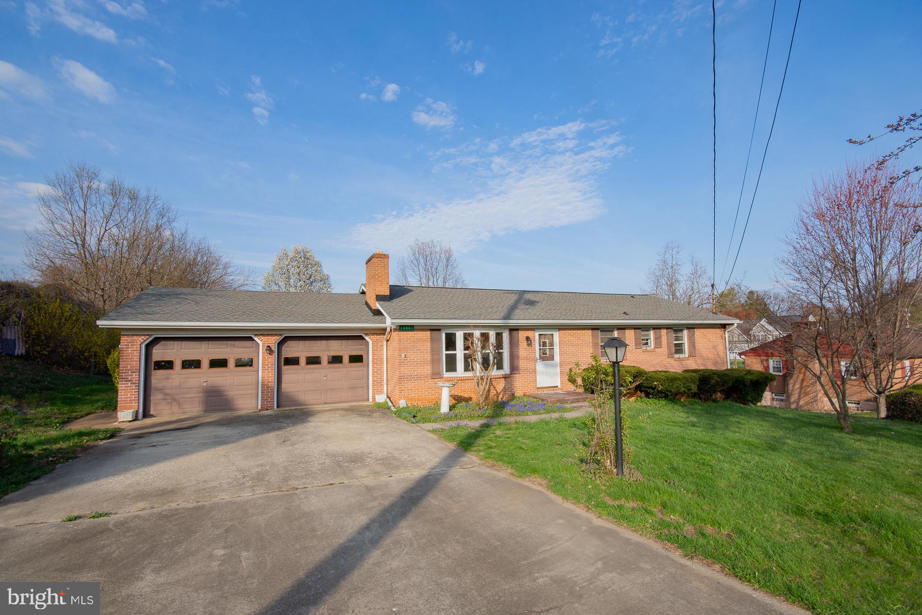 Nice  one owner all brick rancher with a two car garage on over a third of an acre lot convenient to everything. This home features 3 bedrooms with wood floors and 1.5 baths. A large country kitchen with granite and back splash. A separate dining room with wood floors.  The living room  with a bay window, wood floors and a wood burning fireplace to relax in on those cold winter nights.  A full walkout basement for storage or finish off for future living space. Walk out to the spacious yard and a patio area to enjoy your morning coffee. Schedule a showing today. A Must See!!