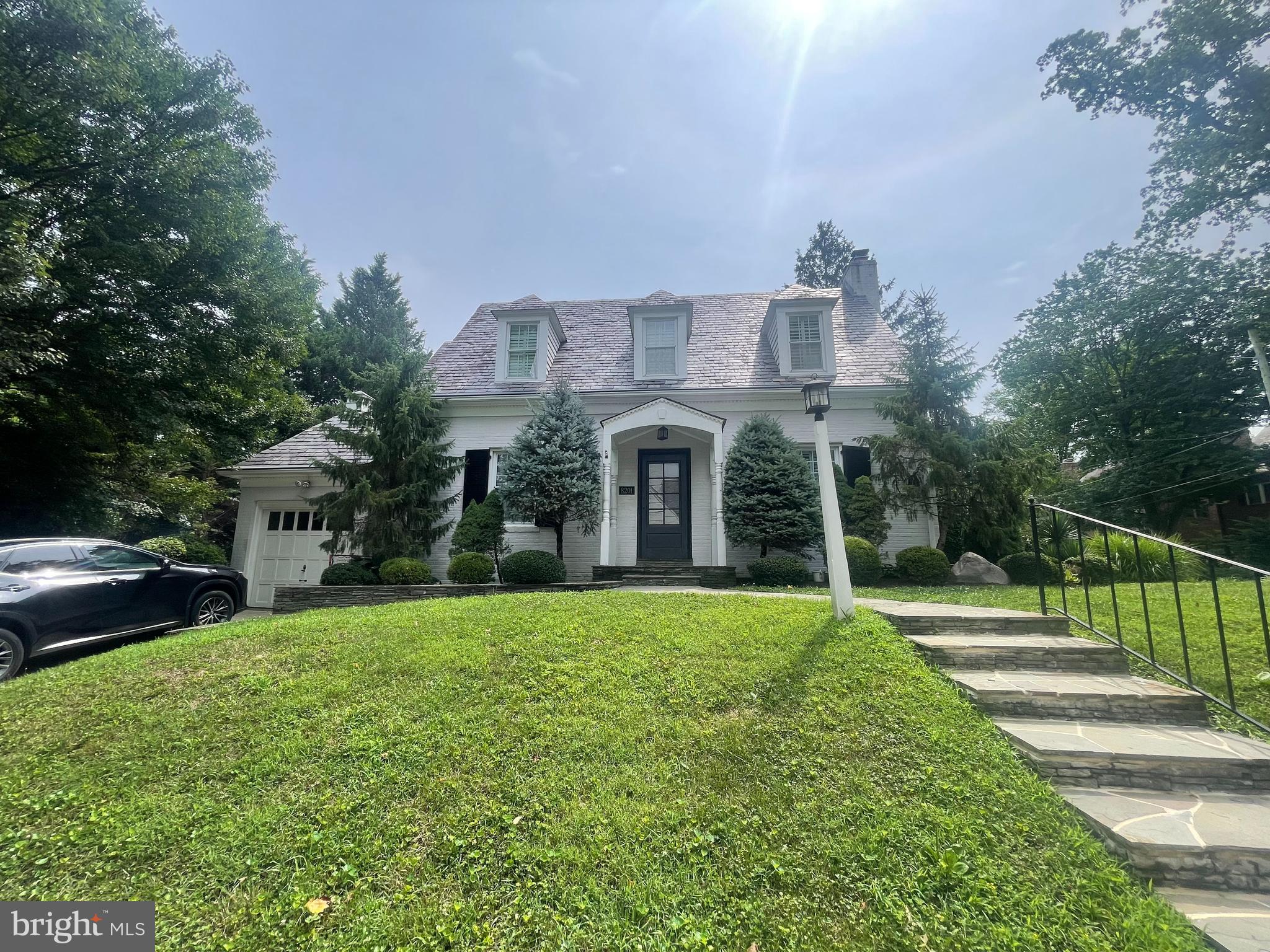 Stunning Chevy Chase home set on a beautifully landscaped corner lot with a wonderful screened porch, offering exceptional indoor and outdoor living. The main level features a spacious living room with a fireplace and custom built-in bookshelves, a gourmet eat-in kitchen with an adjoining breakfast area, a separate formal dining room, and a versatile study highlighted by a large picture window and skylight,  powder room and access to the expansive screened porch, patio, and yard. Upstairs are two generously sized bedrooms and a full bath.  The finished lower level offers a recreation room with a fireplace, an additional room with a small window and adjoining full bath, a laundry room with a washer and dryer and shelves and outside exit.  Additional features include a one-car garage and driveway. Ideally located just minutes from the restaurants and shops of downtown Bethesda, Friendship Heights, and Washington, DC, with easy access to multiple Metro stations, bus lines, I-495, and the future Purple Line. A truly beautiful home.