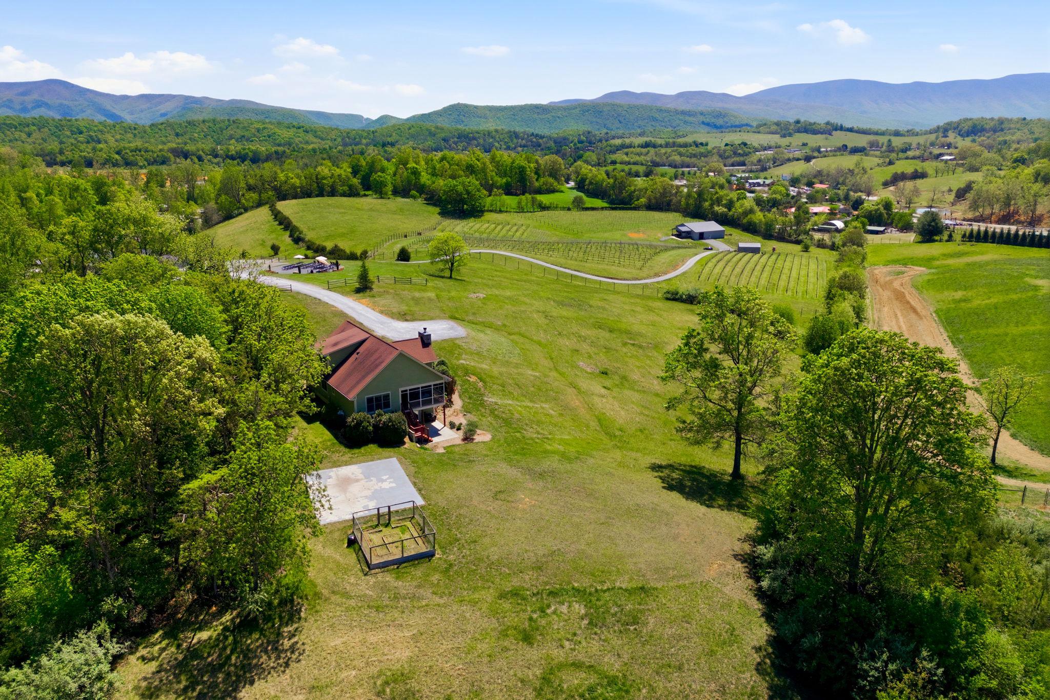 Rarely does an opportunity arise to own a piece of the Shenandoah Valley’s soul.​ Situated on nearly 28 pristine acres in Natural Bridge, Virginia, Great Valley Farm Brewery and Winery is a turnkey legacy.​ This dual-licensed agritourism destination offers a sophisticated custom residence, an established vineyard, and a thriving craft beverage operation with panoramic mountain views that are quite simply unparalleled.​

The primary residence is a stunning, custom-built Hardie-Plank clad home from 2013 designed for easy flow and modern comfort.​ Spanning over 2,000 square feet of above-grade living space, the home features primary and guest bedrooms on the main level, hardwood floors, and a shaker cabinet kitchen with a central island and modern stainless steel appliances.​ An expansive loft provides a perfect home office or additional bedroom space, while the three-season room offers a front-row seat to the Blue Ridge mountains.​ For those looking to expand, the 1,622 square foot full unfinished basement with French doors leading to a private patio offers equity potential.​

The commercial footprint is a dual-threat powerhouse, operating with both brewery and farm winery licenses.​ The cozy 1,979 square foot tasting room captures the farmhouse aesthetic with views into the brewery, while the massive 3,343 square foot production building added in 2019 features commercial floor drains and climate-controlled storage.​ With 5.5 acres under vine producing high-quality estate fruit and a current production of 400 cases of wine and 200 barrels of beer annually, the infrastructure is built for scale.​

The potential for growth is extraordinary.​ The acreage is perfectly suited for an event pavilion to capture wedding revenue, and the minimal current food service presents an immediate opportunity for a culinary expansion.​ Whether you are an entrepreneur looking to dominate the Virginia wine and beer industry, or a family seeking a majestic farm estate with a built-in income stream, this property is ready for its next chapter.​  2,400 cases and kegs of finished wine and  800 gallons of beer inventory convey with the sale, as does vineyard, brewery, and winery equipment, ensuring a seamless transition into this established, award-winning brand.​

Two parcels: Residence parcel: 4.83 acres; Brewery, Winery, vineyard parcel: 22.73 acres.

Business information and financials available under NDA. Proof of Funds from a recognized financial institution required prior to showing.