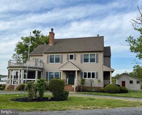 Coming May 8 , this exceptional waterfront estate in Dorchester County offers sweeping panoramic views of Church Creek with direct access to the Chesapeake Bay . Also located in the highly sought after Cambridge South Dorchester School District . Featuring over 470 feet of protected shoreline , a private dock with 4 feet of water depth, and a boat lift , this property is a rare opportunity for true waterfront living . The 3400 square foot , two and  a half story home is thoughtfully designed to capture stunning water views from every angle . In side you will find four spacious bedrooms , including a grand primary suite , along with two full baths and a half bath on the upper level. The main floor is ideal for both everyday living and entertaining . offering a large waterfront dining room , a cozy water view den , and an expansive living room with a wood burning fireplace . The modern kitchen is beautifully updated and includes a pantry and a covered side porch. A unique extended screened porch off the dining room provides the perfect setting to relax and take in the serene views of Church Creek. Upstairs, the luxurious master suite features walk in closets, and the master bathroom showcases a vintage inspired clawfoot tub , a standout feature for those drawn to a modern farmhouse aesthetic , along side a walk in shower. Step out onto your private deck from the master bedroom to enjoy breathtaking sunsets over the water. Two additional bedrooms share a well appointed bathroom , spacious laundry room includes a new washer and dryer . The third floor offers flexible space with two large rooms , ideal for additional bedrooms , a home office , office gym, or media room . Additional features include multiple outbuildings : a two car garage, a kennel with three bays ready for future fencing , and a separate structure perfect for storage of a office. The property spans three lots totaling 3.395 acres of land , accessed by a long privately owned driveway that ensures ultimate privacy . This truly remarkable waterfront retreat where privacy, natural beauty, and expansive water views come together , an opportunity that must be experienced to  be fully appreciated
