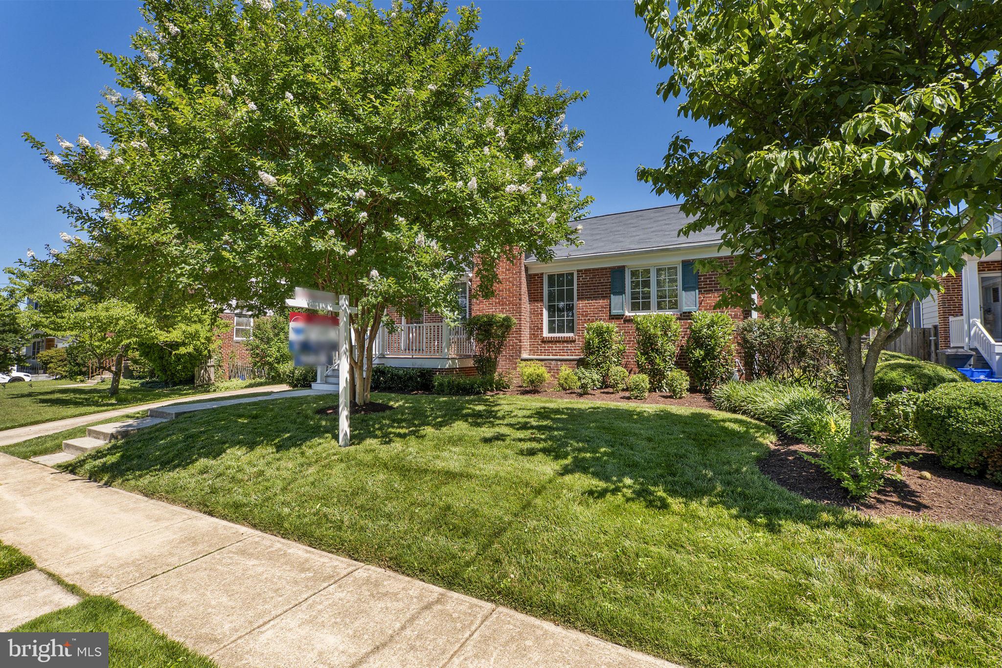 Nestled in the sought-after Garrett Park Estates community, this beautifully maintained brick rambler offers the perfect blend of timeless charm, thoughtful updates, and an exceptional location just moments from Kensington and the renowned Strathmore Music Center. Enhanced by a spacious addition that expands the home's comfortable living space, this residence is in excellent overall condition and has been further improved with a brand-new roof and new basement flooring, offering added value and peace of mind for its next owners.

Inside, you'll find three bedrooms and three full bathrooms, along with warm hardwood and carpeted flooring and updated lighting and fixtures throughout. The upgraded eat-in kitchen serves as the heart of the home, featuring stainless steel appliances, upgraded countertops, and a sunny breakfast area ideal for everyday dining. The formal dining room provides the perfect setting for entertaining, while the inviting living room is anchored by a cozy wood-burning fireplace, creating a welcoming atmosphere for gatherings.

The spacious primary suite offers a peaceful retreat with a walk-in closet and a luxurious soaking tub, while several bathrooms have been tastefully updated with modern finishes. The finished basement, complete with brand-new flooring, expands the home's versatility and is perfect for recreation, hobbies, guests or additional living space.

Step outside to enjoy the beautifully landscaped yard with tranquil garden views, where the covered deck create wonderful spaces for outdoor dining, relaxing, or entertaining. A concrete driveway provides parking for up to three vehicles.

Ideally situated in one of the area's strongest real estate markets, this home offers convenient access to the shops and restaurants of Kensington, Strathmore Music Center, parks, Metro, and major commuter routes. Garrett Park Estates is known for its welcoming community atmosphere, excellent schools, and beautiful tree-lined streets, making this an outstanding opportunity to enjoy comfort, convenience, and lasting value in an exceptional location.