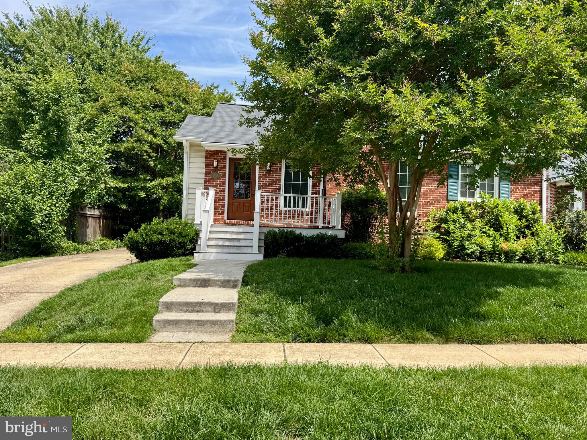 Nestled in the sought-after Garrett Park Estates community, this beautifully maintained brick rambler offers the perfect blend of timeless charm, thoughtful updates, and an exceptional location just moments from Kensington and the renowned Strathmore Music Center. Enhanced by a spacious addition that expands the home's comfortable living space, this residence is in excellent overall condition and has been further improved with a brand-new roof and new basement flooring, offering added value and peace of mind for its next owners.

Inside, you'll find three bedrooms and three full bathrooms, along with warm hardwood and carpeted flooring and updated lighting and fixtures throughout. The upgraded eat-in kitchen serves as the heart of the home, featuring stainless steel appliances, upgraded countertops, and a sunny breakfast area ideal for everyday dining. The formal dining room provides the perfect setting for entertaining, while the inviting living room is anchored by a cozy wood-burning fireplace, creating a welcoming atmosphere for gatherings.

The spacious primary suite offers a peaceful retreat with a walk-in closet and a luxurious soaking tub, while several bathrooms have been tastefully updated with modern finishes. The finished basement, complete with brand-new flooring, expands the home's versatility and is perfect for recreation, hobbies, guests or additional living space.

Step outside to enjoy the beautifully landscaped yard with tranquil garden views, where the covered deck create wonderful spaces for outdoor dining, relaxing, or entertaining. A concrete driveway provides parking for up to three vehicles.

Ideally situated in one of the area's strongest real estate markets, this home offers convenient access to the shops and restaurants of Kensington, Strathmore Music Center, parks, Metro, and major commuter routes. Garrett Park Estates is known for its welcoming community atmosphere, excellent schools, and beautiful tree-lined streets, making this an outstanding opportunity to enjoy comfort, convenience, and lasting value in an exceptional location.