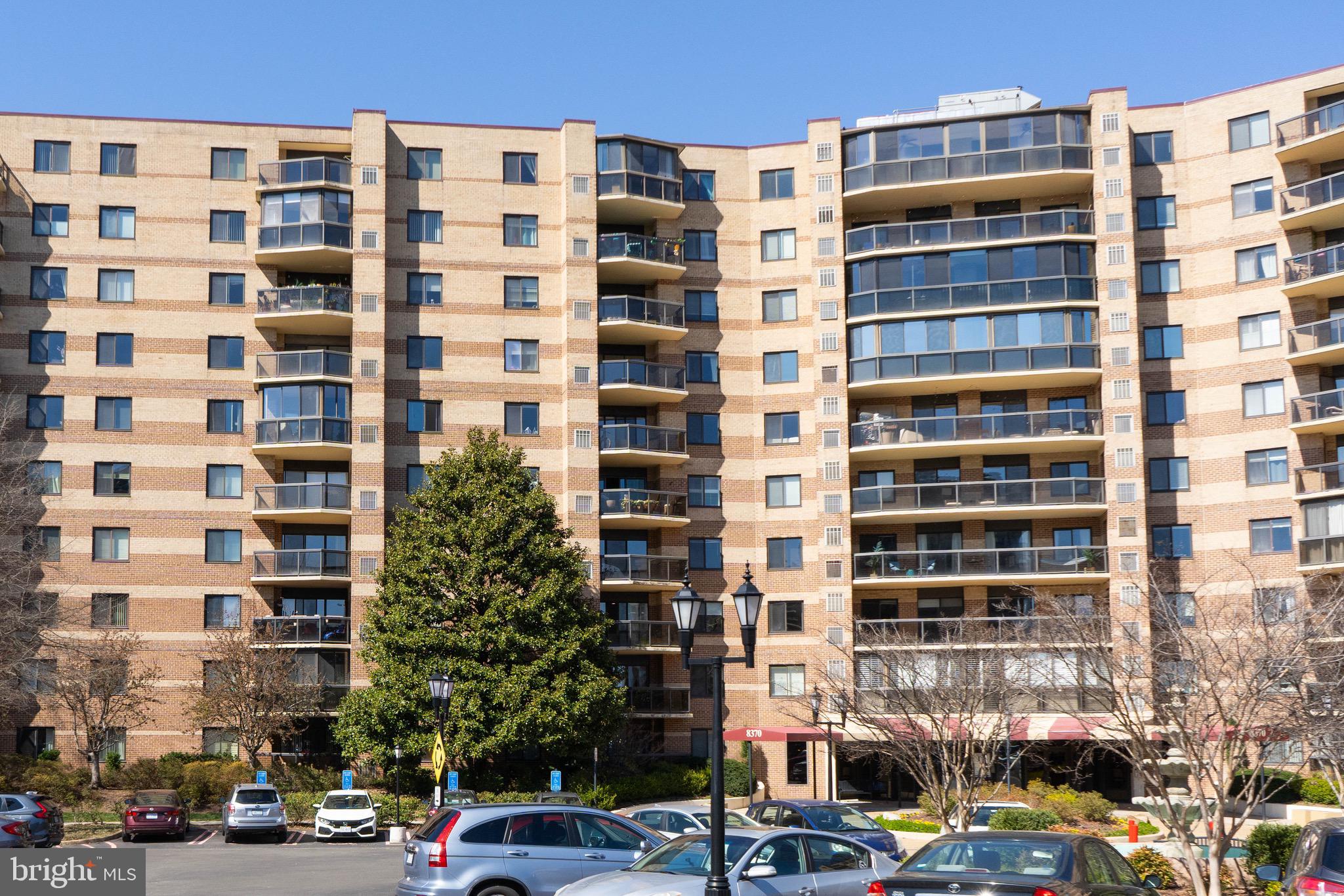 A beautiful 34-acre gated condominium community just minutes away from Tysons Galleria and Tysons Corner Mall. Landscaping, fountains, and drive circles make a gracious entryway and site that is patrolled 24 hours a day by a full security department. Indoor amenities for residents include an indoor swimming pool, spas, saunas, a Business Center, Fitness Center, Digital Gaming Room, and billiard and ping-pong tables. Outdoor amenities include an outdoor swimming pool, tennis courts, mini soccer field, sand volleyball court, and basketball court. The condominium also has a Concierge Shuttle Bus that can take residents to the Metro Station and local shopping areas.
