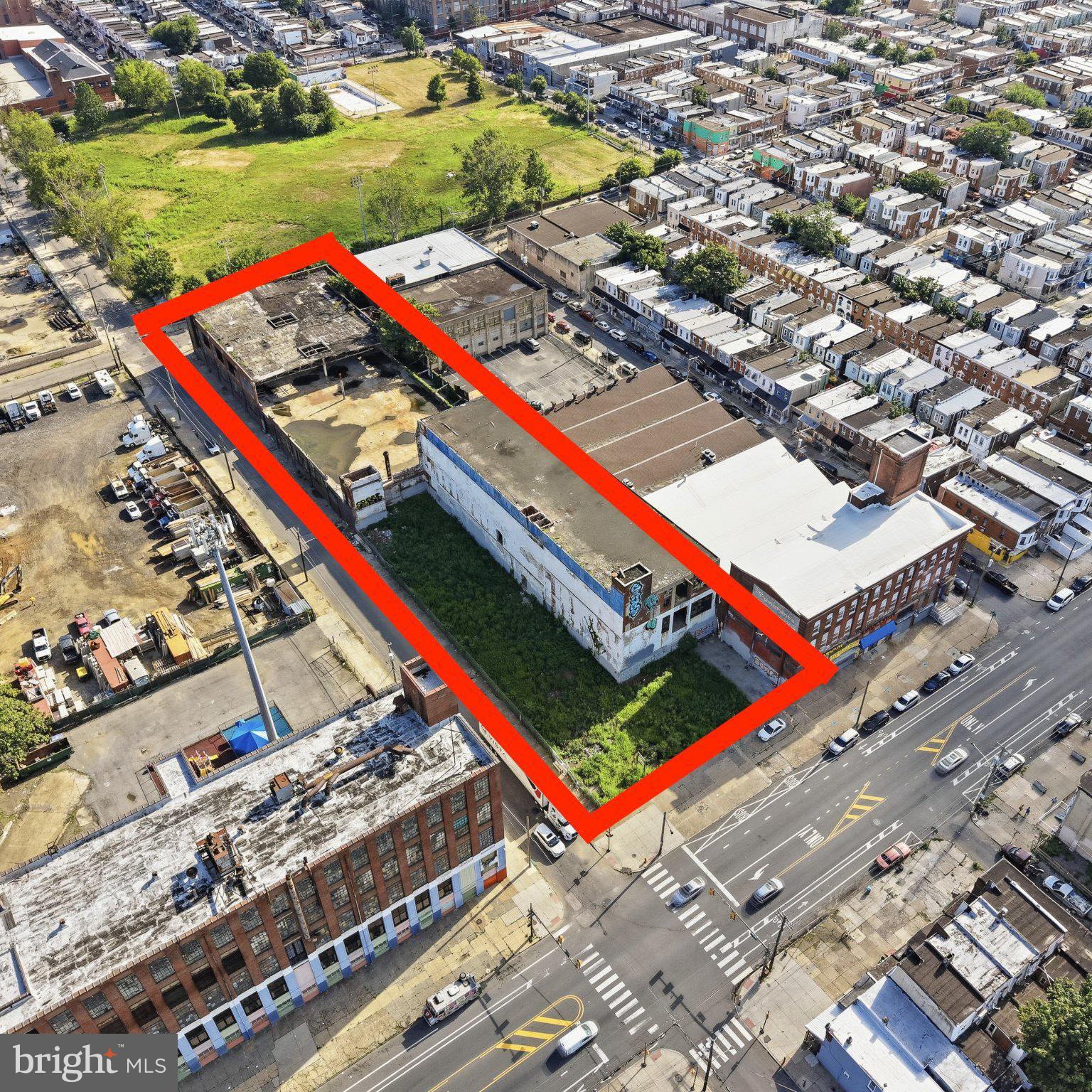90,000+ SF | Sale or Lease | Approved Expansion | Subdivision Potential

An exceptional opportunity to acquire one of Philadelphia's most distinctive industrial redevelopment campuses. Encompassing more than 90,000 square feet across two interconnected reinforced concrete buildings, this historic property occupies a highly visible corner along heavily traveled Allegheny Avenue in one of Philadelphia's fastest-evolving industrial and commercial corridors.

With demand for adaptive reuse projects, industrial flex campuses, and self-storage conversions continuing to grow throughout the region, this property presents an outstanding opportunity for developers, investors, owner-users, or institutional operators seeking a large-scale redevelopment or long-term investment.

The campus consists of:

• A 31,500 SF three-story reinforced concrete building fronting Allegheny Avenue featuring approximately 17-foot ceilings on every floor, abundant natural light, and spectacular Center City skyline views from the upper level.

• An adjoining 56,000 SF two-story mushroom-column industrial building offering approximately 15-foot ceilings on the first floor, nearly 19-foot ceilings on the second floor, and an oversized interior drive-in loading bay accessed directly from C Street.  

Approximately 15,000 square feet of the second floor was impacted by a historic fire prior to the current ownership. All fire-damaged materials have been professionally removed and the building has been fully cleaned, providing a clear foundation for future redevelopment.

Constructed of reinforced concrete and steel, the property offers the heavy floor loads, wide structural bays, and industrial character increasingly sought after for modern adaptive reuse projects.

The property is zoned I-2 and benefits from a recently approved Philadelphia zoning permit authorizing the construction of an additional building above an existing attached structure. The zoning approval also permits retail sales of building supplies and equipment together with wholesale, distribution, storage, and equipment/material storage uses, providing significant future development flexibility. The approved plans also include 38 surface parking spaces, including accessible parking, along with 12 bicycle parking spaces.

Potential uses include:
Self-storage conversion
Multi-tenant industrial campus
Contractor headquarters
Manufacturing
Warehouse and distribution
Creative office
Showrooms
Food production
Fitness and recreational facilities
Educational or maker spaces
Last-mile logistics
Mixed industrial flex redevelopment

The existing layout also offers the ability to subdivide portions of the campus for multiple tenants or phased redevelopment, allowing investors to create diverse income streams while preserving future expansion opportunities.

Environmental remediation has already been completed, including the removal, closure, and regulatory certification of former underground storage tanks, providing purchasers with confidence as they move toward redevelopment or occupancy.

The property sits just two blocks from the highly successful D Street Studios adaptive reuse project, illustrating the continued transformation of this section of Philadelphia into a thriving destination for creative businesses, light manufacturing, entrepreneurs, and industrial users. It also enjoys immediate access to I-95, the Delaware waterfront, Port Richmond, Fishtown, Northern Liberties, Center City, and the region's major transportation corridors.

Whether your vision is a flagship owner-user headquarters, a high-performing self-storage facility, a multi-tenant industrial campus, or Philadelphia's next successful adaptive reuse project, this rare offering provides the scale, infrastructure, approved development potential, and location to bring that vision to life.