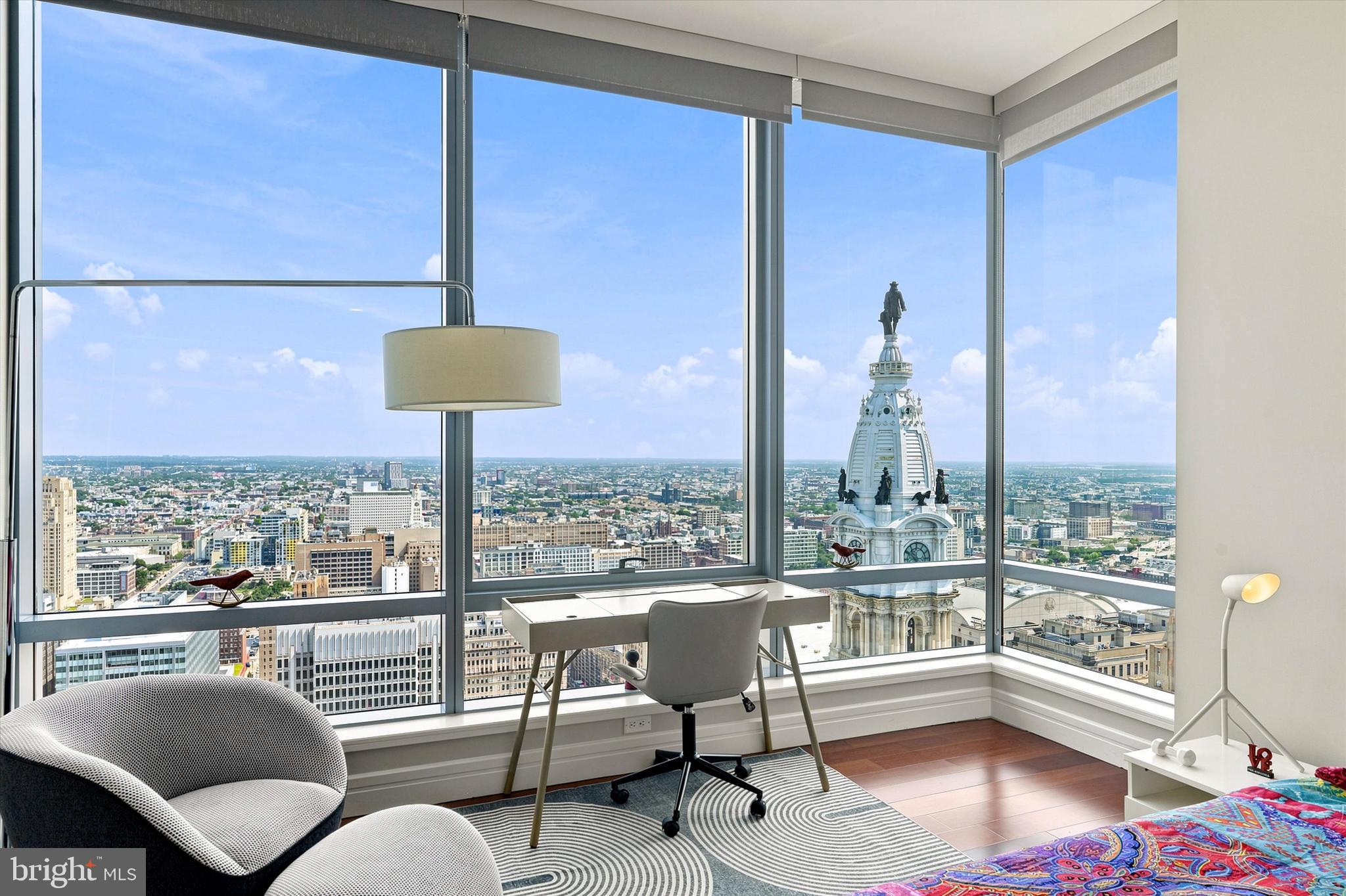 Welcome to your elegant, spacious, pristine home in the heart of the City, with views of the best of Philadelphia from all of your 10-ft., floor-to-ceiling windows!
From the gracious foyer to the large living space, to the private main bedroom suite and a second bedroom with views like no other, this home says both, “be comfortable and “show me off”.
A very spacious, gourmet kitchen with a view of William Penn atop of City Hall, features Sub-Zero refrigerator, Viking gas cooktop, wall and microwave ovens, Gaggenau exhaust hood, Miele dishwasher, U-Line wine cooler and plenty of cabinet and counter space.
The main bedroom suite has two full baths with Calacatta Gold marble, walk-in showers and a soaking tub in one of them. It also has two large walk-in closets, one of which is designed as an office, and an additional closet. 
The second bedroom has an en-suite bath and unbeatable views!
Laundry room, half bath and plenty of closet space complete the comforts of the home.
Luxury living at its best with access to world-class Ritz-Carlton services and resident-only amenities. These include 24-hour concierge, porter and valet services; chauffeur service; a state-of-the-art fitness center; an indoor lap pool, hot tub, and locker rooms with showers; and a private yoga room. The resident lounge is perfect for daily use or private events at no additional cost. Additional amenities include a theater room, a newly renovated outdoor terrace with grills, dining areas, fire pits, and lounge seating, an on-site dog park, and a gated garden.