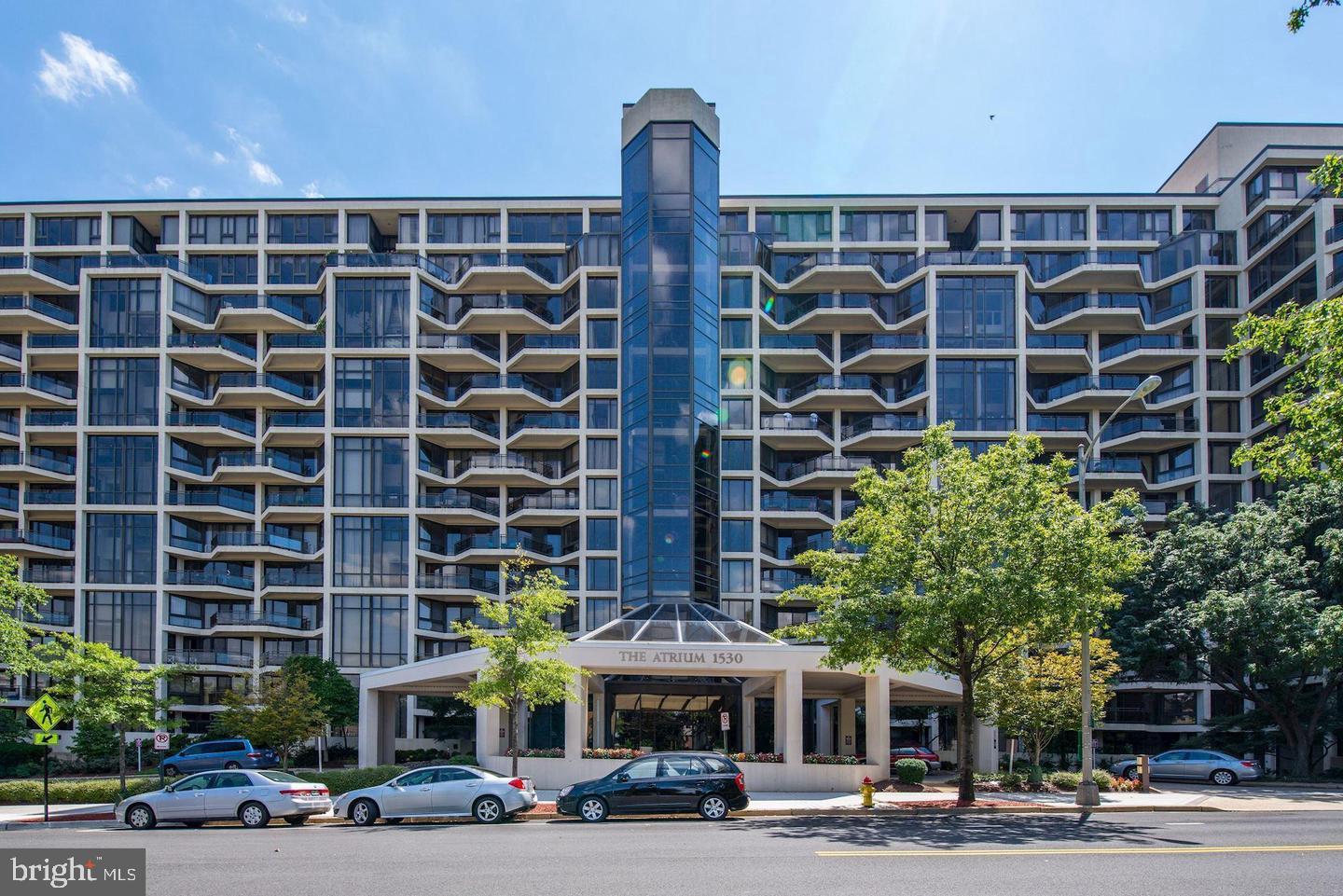 New photos coming soon! Available June 1!! Fully renovated unit w/large balcony, lovely VIEWS of Georgetown from every room and parking and storage space included!! Excellent floor plan with 2 bedrooms on separate sides of the living room with their own renovated bathrooms! Kitchen with granite counters & stainless steel appliances, open to a spacious living area! Prime location : steps to Rosslyn METRO , and very close to Key Bridge and Georgetown! The Atrium condos is a very well managed building that offers many amenities including a 24 hour front desk, outdoor swimming pool, gym and tennis courts!
