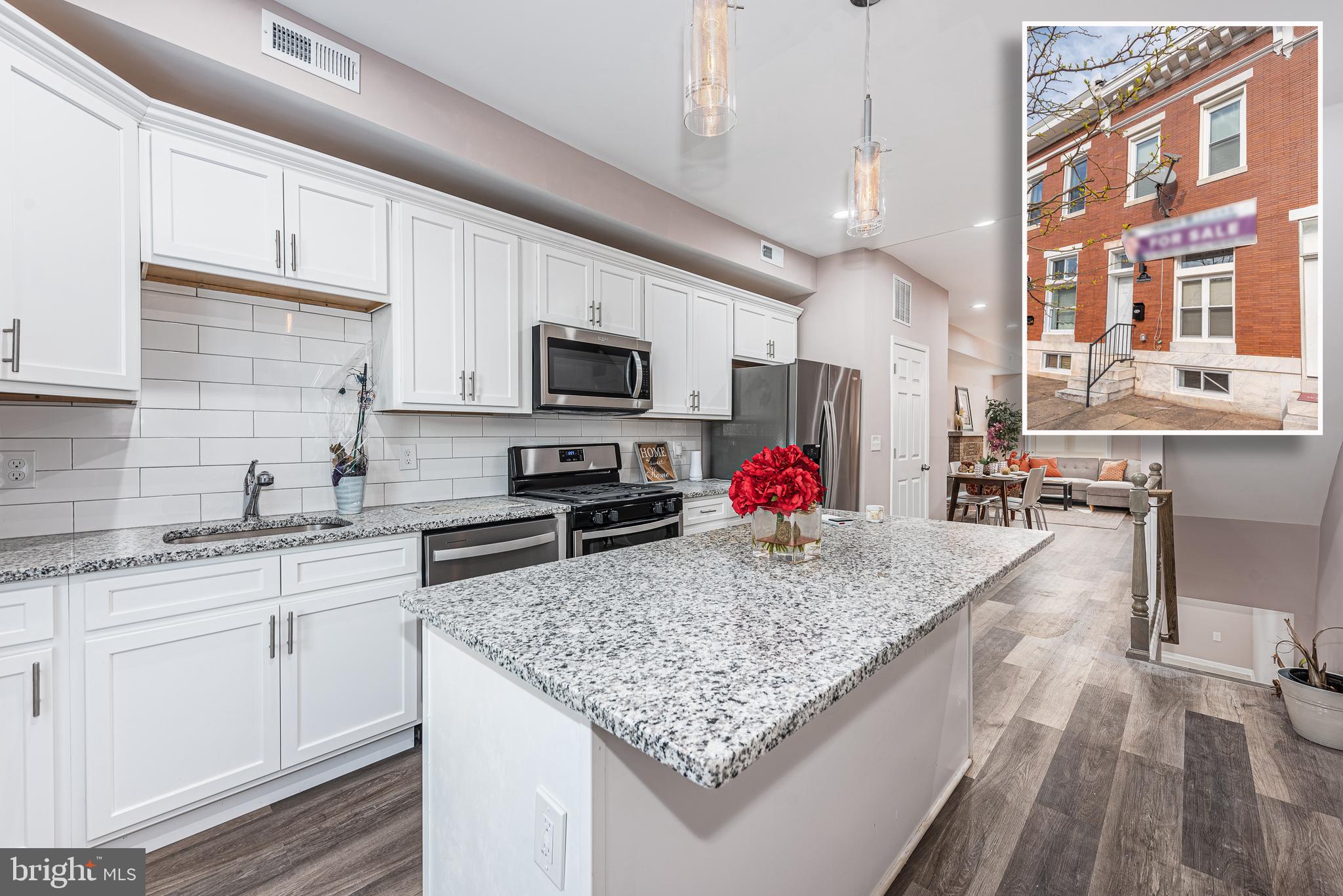 PICTURE PERFECT RENOVATION WITH AN OPEN FLOOR PLAN AND 3 FINISHED LEVELS OF LIVING SPACE!  Features include an inviting living room with a decorative fireplace and dining area, a Chef's island kitchen with granite counters and ss appliances, a convenient main level half bath, upper level Primary bedroom suite with a full bath with a double vanity and spa shower, 2nd generously sized bedroom with a hall bath, a fully finished basement with a family room, 3rd full bedroom and 3rd full bath, and a private rear patio.  This one has it all!