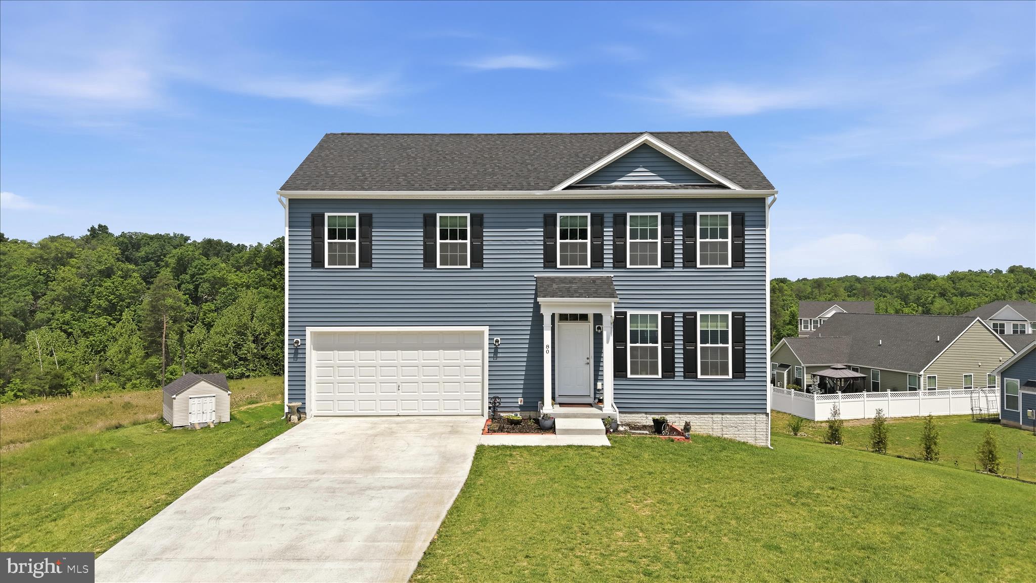 Welcome to 80 Thyme, a beautifully maintained 2025-built home offering the benefits of new construction without the wait. Step inside to a bright, open-concept main level featuring LVP flooring and a stunning kitchen with white cabinetry, quartz countertops, a large island, and a pantry. The first floor also includes a half bath, an oversized laundry room, and access to the two-car garage. Upstairs, you'll find four generously sized bedrooms, including a spacious primary suite with a walk-in closet and private bath. The walk-out basement features tall ceilings, a rough-in for a future full bath, and an open layout with endless possibilities for additional finished living space. A rare combination of space, location, and future potential, 80 Thyme is ready to impress. Conveniently located just off Route 51 with easy access to I-81 and Northern Virginia, this home combines modern finishes with an exceptional floor plan.