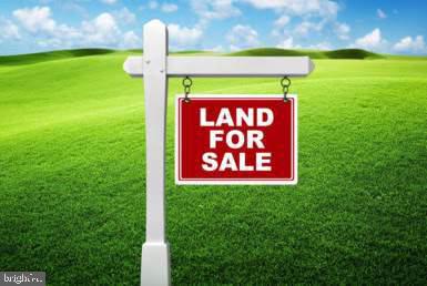 RARE OPPORTUNITY! This LAKEVIEW double lot is across from a community owned lake access that offers an unobstructed view of beautiful Lake Carobeth. The end of the cul-de-sac leads directly to the main beach, swimming pool and clubhouse in just about a 2 minute walk. This oversized lot in a short term rental friendly community would be a perfect place to build a Lakehouse with easy access to all the amenities. Lot 122E is also for sale