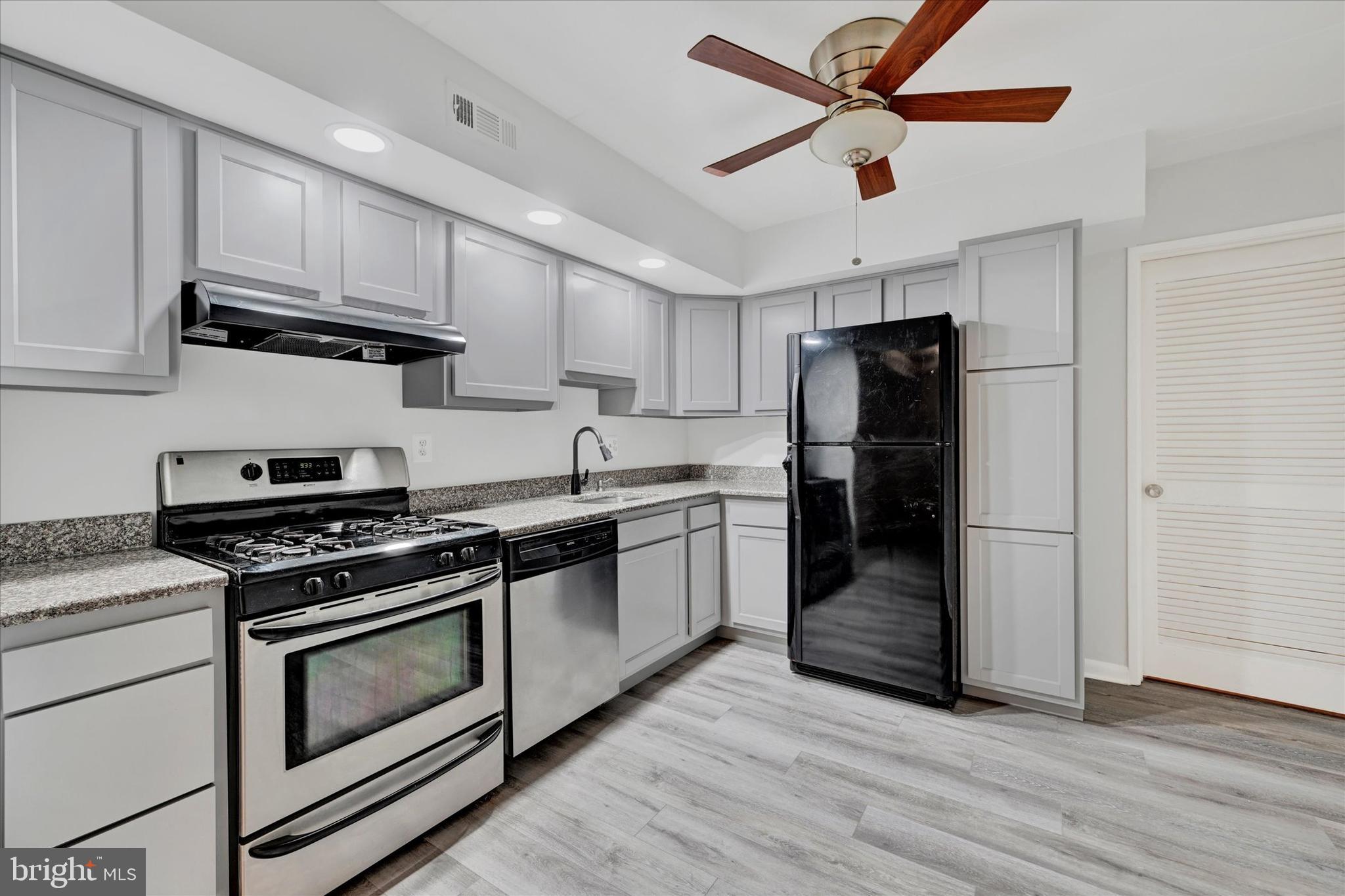 Enjoy a low maintenance lifestyle in this sweet contemporary condo in Columbia.  Enter through your own private courtyard area!  An open floor plan is welcoming and spacious.  Attractive kitchen with lots of cabinets and adjacent laundry area.  Recent LVP flooring throughout.  Primary bedroom with walk-through closet and primary bath with walk-in shower w/bench seating.  A stone's throw to Columbia Mall, excellent commuter location.  SEE IT TODAY!!