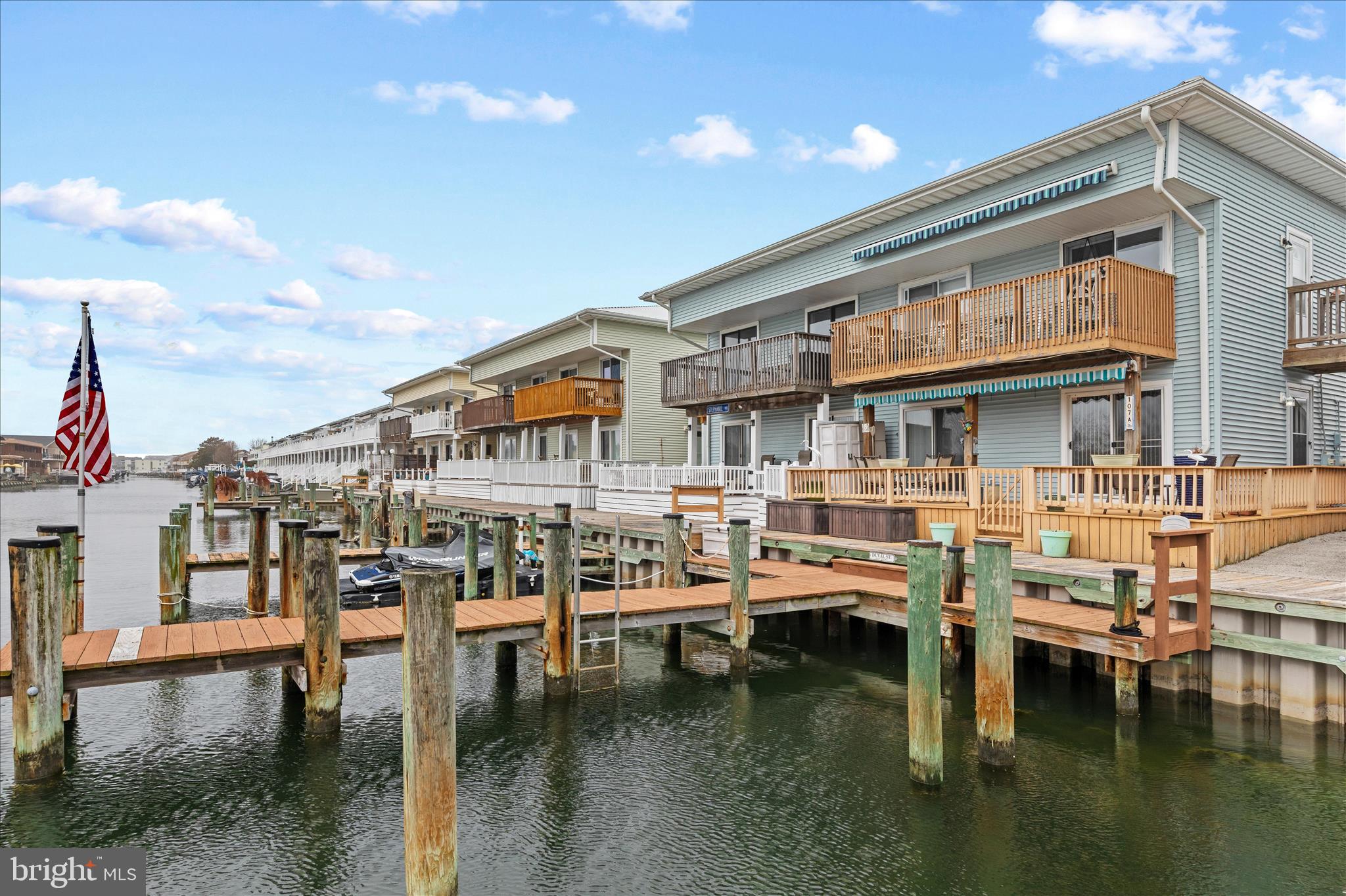 ** Waterfront Condo with Private Boat Slip in North Ocean City – Rare Canal-Front Opportunity ** Experience the best of coastal living in this beautifully maintained waterfront condo in North Ocean City, featuring 30 feet of canal frontage and a private boat slip that conveys with the sale. Located on the first floor for easy access and convenience, this spacious 3-bedroom, 2-bath residence offers the ideal blend of comfort, boating lifestyle, and investment potential. Lovingly cared for by the original long-term owners and never used as a rental, this move-in-ready property stands apart from many waterfront offerings in Ocean City. The open floor plan is designed for relaxed beach living, while the generous primary suite overlooks the canal, creating a peaceful waterfront retreat. Step outside to enjoy composite decking, wood railings, a vinyl bulkhead, and an electronic awning—thoughtful upgrades that enhance both enjoyment and durability. From your private slip, enjoy direct bay access for boating, fishing, paddle-boarding, crabbing, or evening sunset cruises. Just minutes from the beach, restaurants, shopping, golf, and entertainment, this prime North Ocean City location places everything you love about the Eastern Shore within easy reach. Offered furnished for a turnkey experience (excluding select personal items), this property also presents a unique opportunity for buyers seeking immediate income potential or long-term flexibility. The sellers are willing to lease the property back from the new owner on a long-term basis, creating an attractive option for investors seeking stable occupancy from day one. Waterfront condos with private boat slips, direct bay access, and this level of pride of ownership are becoming increasingly difficult to find. Don't miss the opportunity to own a premier canal-front property in one of Ocean City's most sought-after boating communities.