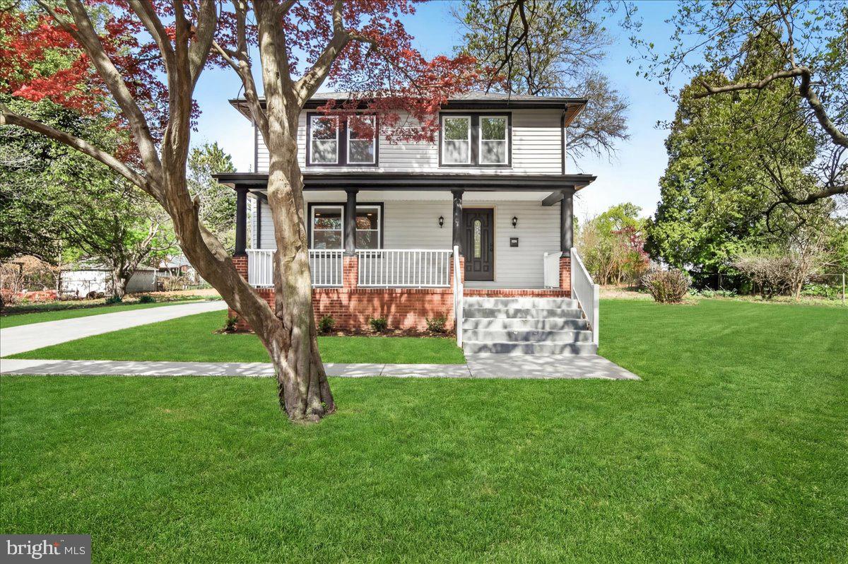 Welcome to Wilson! This beautifully reimagined 1920s Charming Colonial in Downtown Frederick blends timeless appeal with modern efficiency across a classic three-story layout. Thoughtfully renovated down to the studs, this home has been completely updated with new plumbing, electrical, insulation, siding, gutters, roof, windows, HVAC, and high-efficiency systems—offering peace of mind and contemporary comfort.
Warm, inviting, and full of character, the main level features a stunning new kitchen with white cabinetry, and accented dark center island, granite countertops, stainless steel appliances, electric cooking, and a spacious walk-in pantry. The main level also offers a flexible living/family room, a separate dining room, a convenient laundry room with washer and dryer, and a stylish half bath.
Upstairs, you’ll find three generously sized primary suites, each with its own private full bathroom—along with walk-in closet space, providing both comfort and privacy for all.  The finished basement adds versatile living space perfect for a game room, home office, exercise, or additional lounge area, plus a separate utility room with excellent storage.
Outside, enjoy a covered rear porch overlooking the expansive 0.83-acre lot—an incredible find in Downtown Frederick—offering endless possibilities for gardening and entertaining. Additional exterior features include a newly paved expansive driveway, brand new 1 car detached garage with electric, and a sprawling front porch.
Ideally located near major commuter routes, this one-of-a-kind home combines historic charm, modern upgrades, and rare outdoor space—making it a must-see!