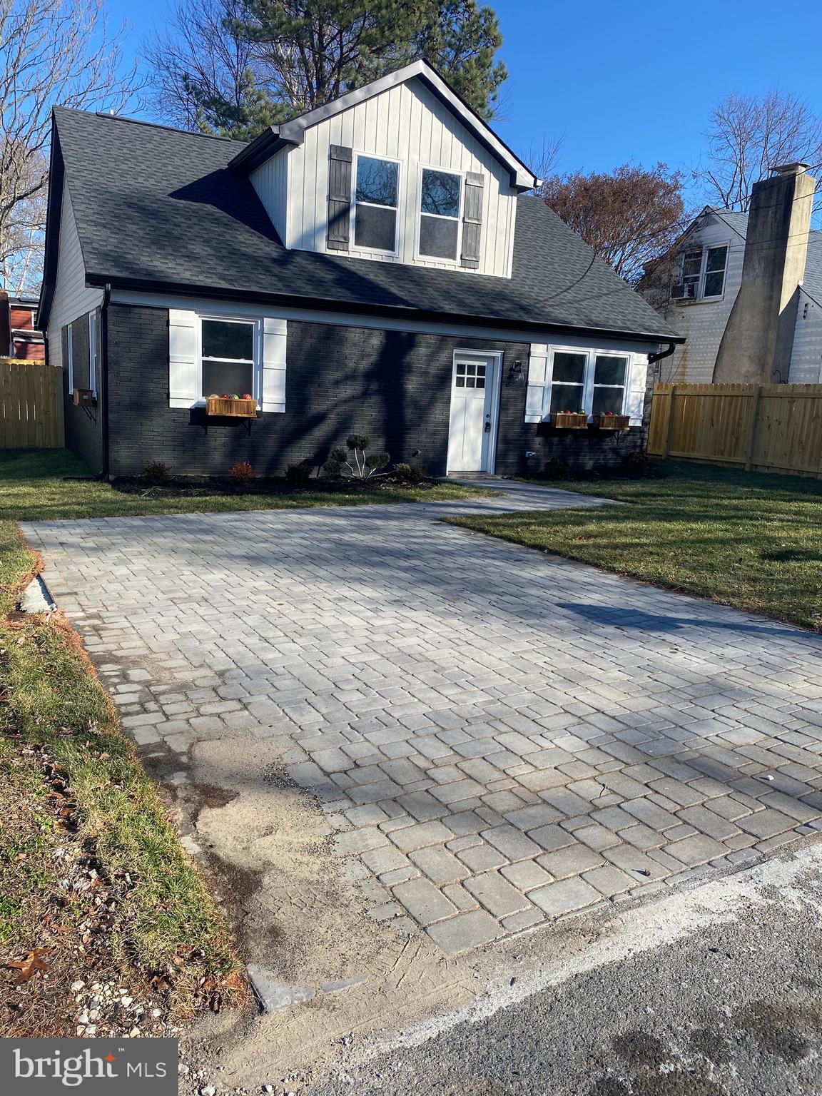 This home has had a complete renovation from top to bottom including an addition and a second floor add on. This home now boasts 5 beds 3 full baths. This renovation included a new roof, siding, windows, hvac, plumbing, electric, sprinkler system, new floors, bathrooms, kitchen, appliances, fenced in back yard, paver patio out back and paver driveway and so sooo much more. Main floor includes three bedrooms and two baths with a first-floor laundry. Second floor has two additional beds with a jack and jill bathroom.  Seller is providing a home warranty.