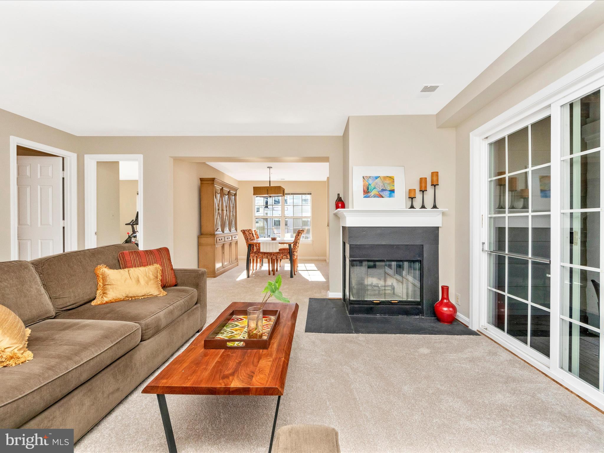 *** This is not a typo! The absolute best value in Kentlands! Just reduced for  a quick sale! SELLER TO PAY OFF ASSESSMENT AT SETTLEMENT. Welcome to 112 Kendrick Place, Unit #22, a sun-drenched 2-bedroom, 2-bath condominium in the highly sought-after Kentlands community of Gaithersburg, MD. This charming home combines comfort, style, and convenience, offering a spacious layout with modern updates throughout.   As you enter, you'll immediately notice the abundance of natural light that fills the open-concept living area. The living room features a cozy woodburning fireplace, perfect for relaxing or entertaining, and opens to a private outdoor balcony—ideal for enjoying your morning coffee or evening sunsets.   The unit has been freshly painted throughout in neutral tones, providing a bright and welcoming atmosphere. Brand new carpet adds a plush feel to the living spaces, making this home move-in ready.  In addition, the owner has just installed a brand new Lennox  HVAC system!  The recently updated kitchen is a chef’s dream, complete with sleek granite countertops, a breakfast bar, stainless steel appliances, and durable LVP flooring. Designer lighting adds a touch of sophistication, creating a warm and inviting atmosphere. The spacious owner’s suite is a true retreat, featuring a walk-in closet, ceiling fan, and direct access to the outdoor balcony. The ensuite bathroom is a luxurious haven, boasting a soaking tub with jets, a separate shower with tile surround, and a double vanity. A second full bath with a tub/shower and ceramic tile completes the home.  The Kentlands community offers an impressive range of amenities, including community pools, dining options, a Starbucks, Fresh Fields Market, and vibrant spaces like the Arts Barn and community green space. The neighborhood features an abundance of sidewalks, making it perfect for walking or biking around the area, plus you can enjoy easy access to shops, restaurants, and a serene lake—ideal for outdoor recreation. Kentlands Ridge community is undergoing an exciting renovation, with plans for Hardi plank exteriors, further enhancing the community’s appeal.    The unit is located in a secure building with controlled access, providing peace of mind and privacy. This is more than just a home; it’s a lifestyle! Don’t miss the chance to own this sunlit condo in one of Gaithersburg's most desirable locations.  **** BUYER ASSUMED THE SPECIAL ASSESSMENT AT CLOSING ****