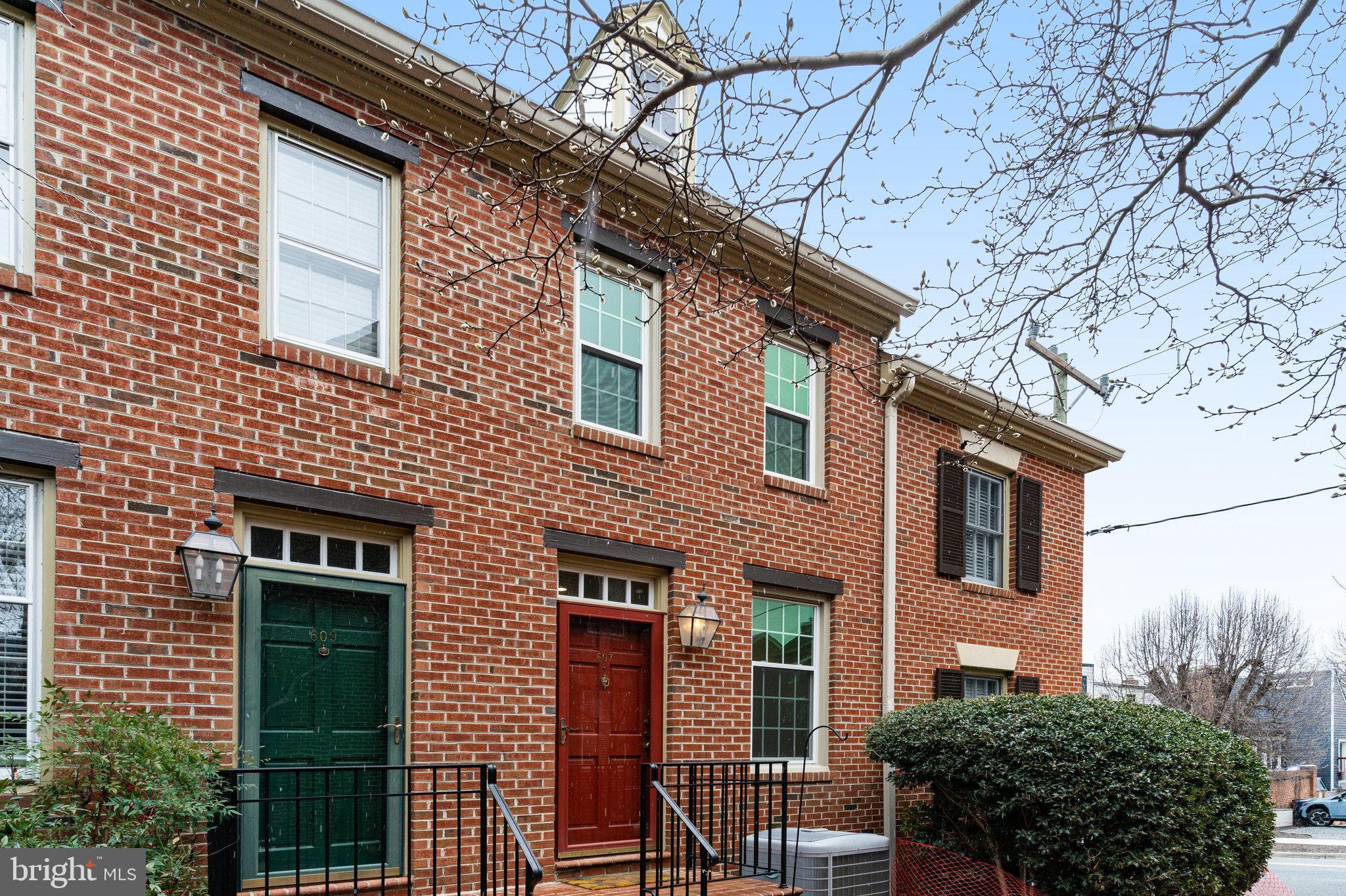 PRICE IMPROVED! Welcome to 607 South Columbus Street in Alexandria, VA—a modern row house that seamlessly blends classic charm with contemporary upgrades. This fully renovated home spans 1,155 square feet and features two spacious bedrooms and 1.5 thoughtfully designed bathrooms. The stunning Kitchen boasts 42" cabinets and state-of-the-art full size appliances.  The Kitchen and Full Bath have been thoughtfully reconfigured to maximize space and function. Enjoy gleaming hardwood floors throughout and a wood-burning fireplace on the main level, creating a cozy atmosphere. You can step outside onto your private patio that is fully fenced. Walk upstairs to your primary bedroom and renovated full bathroom. If you walk upstairs to the upper level, you will have another bedroom and a half bathroom. 

Situated in the vibrant Old Town Alexandria, this home offers easy access to a variety of restaurants, shopping options, recreational activities, commuting routes, public transit, and Reagan National Airport.  WALK SCORE OF 92! Don’t miss the opportunity to make this exceptional home yours. Schedule your visit today!

Condo fee includes: 2 Parking Permits, water/sewer, trash, and common area maintenance, landscaping, courtyard, brick walkways, and 3 parking lots. There is also a secure community bike locker area as well as a secure mail room.

Recent updates include:
2/2024- Full Size (36") Refrigerator with an Icemaker and water filter/dispenser, Stove, Microwave, Dishwasher
5/2023- Washer and Dryer replaced 
11/2020- 5 windows (Bedroom, Bathroom, and Living Room)
4/2020- Hot water heater replaced