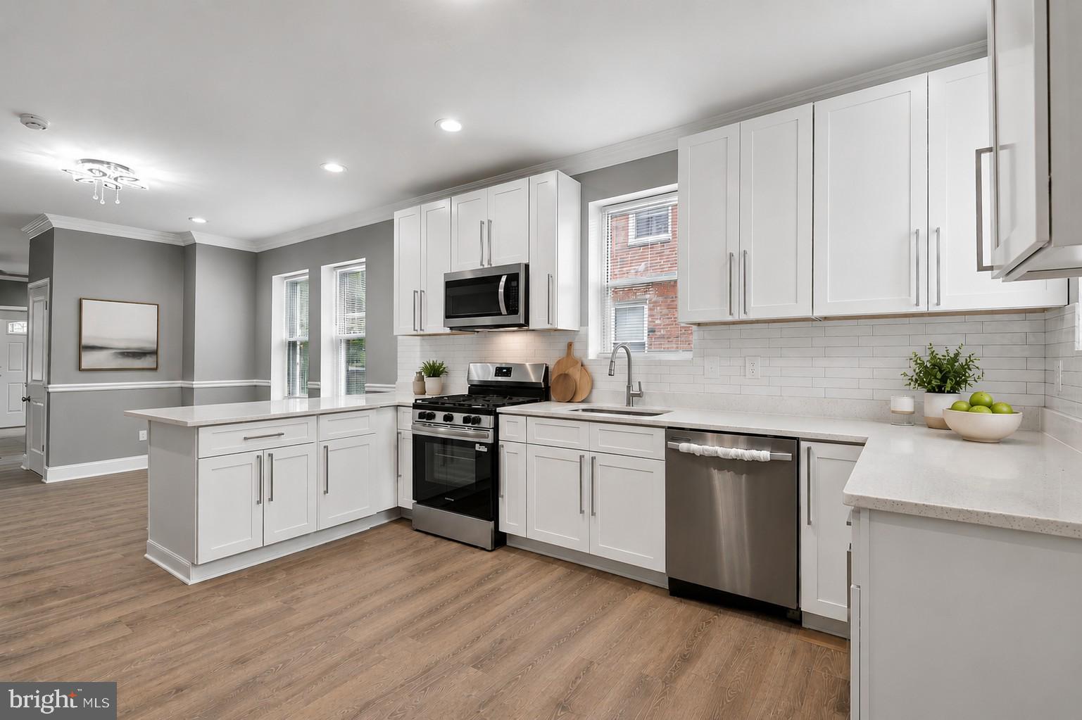 Welcome to this fully renovated home that perfectly blends modern style with thoughtful design. From the moment you step inside, you'll be impressed by the illuminated tray ceilings, abundant natural light. The gourmet kitchen is the heart of the home, featuring quartz countertops, stainless steel appliances, a large center island, and an open-concept layout ideal for entertaining family and friends. The upper level offers 3 spacious bedrooms and a beautifully updated full bathroom. The primary suite serves as a private retreat. Every bathroom throughout the home has been fully renovated with stylish, designer inspired finishes. The fully finished basement provides additional living space, including a large recreation room, a fourth bedroom, and a full bathroom perfect for guests, a home office, or extended family living.
Outside, enjoy a fully fenced backyard and a private driveway, offering both privacy and convenience. This move-in-ready home delivers exceptional updates, modern finishes, and functional living spaces throughout. Don't miss the opportunity to make it yours!