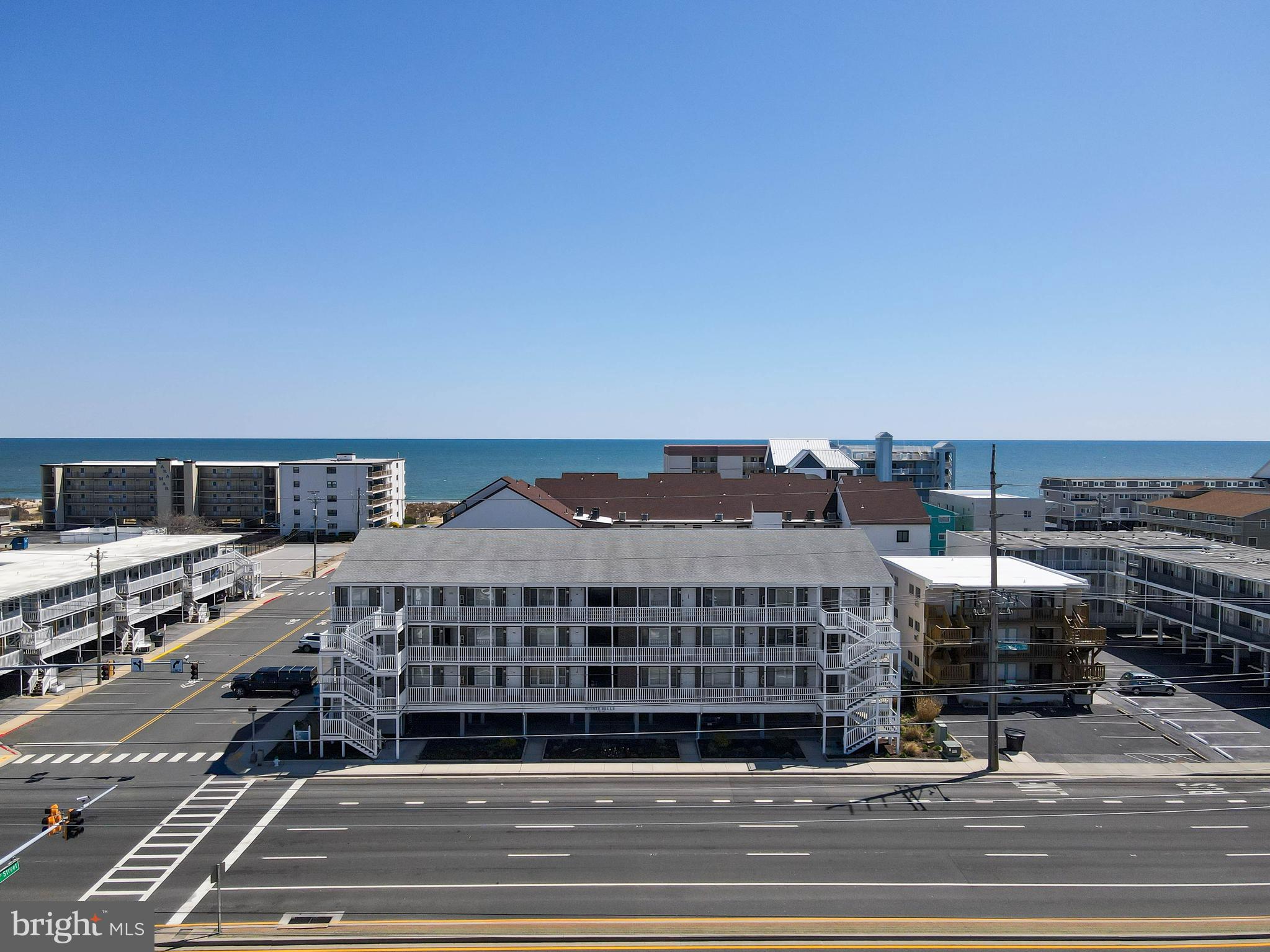 ***Seller is motivated!***
Welcome to your perfect beachside retreat! Nestled just off Coastal Highway on a coveted ocean block, this second-floor end-unit condo puts you moments away from the surf and sand via the 123rd Street dune crossing.

This 1-bedroom, 2-bathroom getaway offers the ideal blend of comfort, convenience, and coastal charm. Inside, you'll find the added functionality of stacked laundry and entrances on both ends of the unit—making beach access and building flow a breeze from either direction. Water heater and Garbage Disposal replaced April 2025. 

Whether you're looking for a serene escape or a savvy investment opportunity, this location hits the mark—centrally located in the heart of Ocean City, you're just a stroll away from vibrant shopping, top-tier dining, and the iconic boardwalk experience.

The building features off-street parking, an outdoor shower for sandy toes, and your own private storage locker for all your beach gear.

Live the salt life with ease, where morning sunrises are a daily ritual and convenience is always within reach. Whether it's your weekend escape or your forever happy place, this coastal gem is ready to welcome you home.