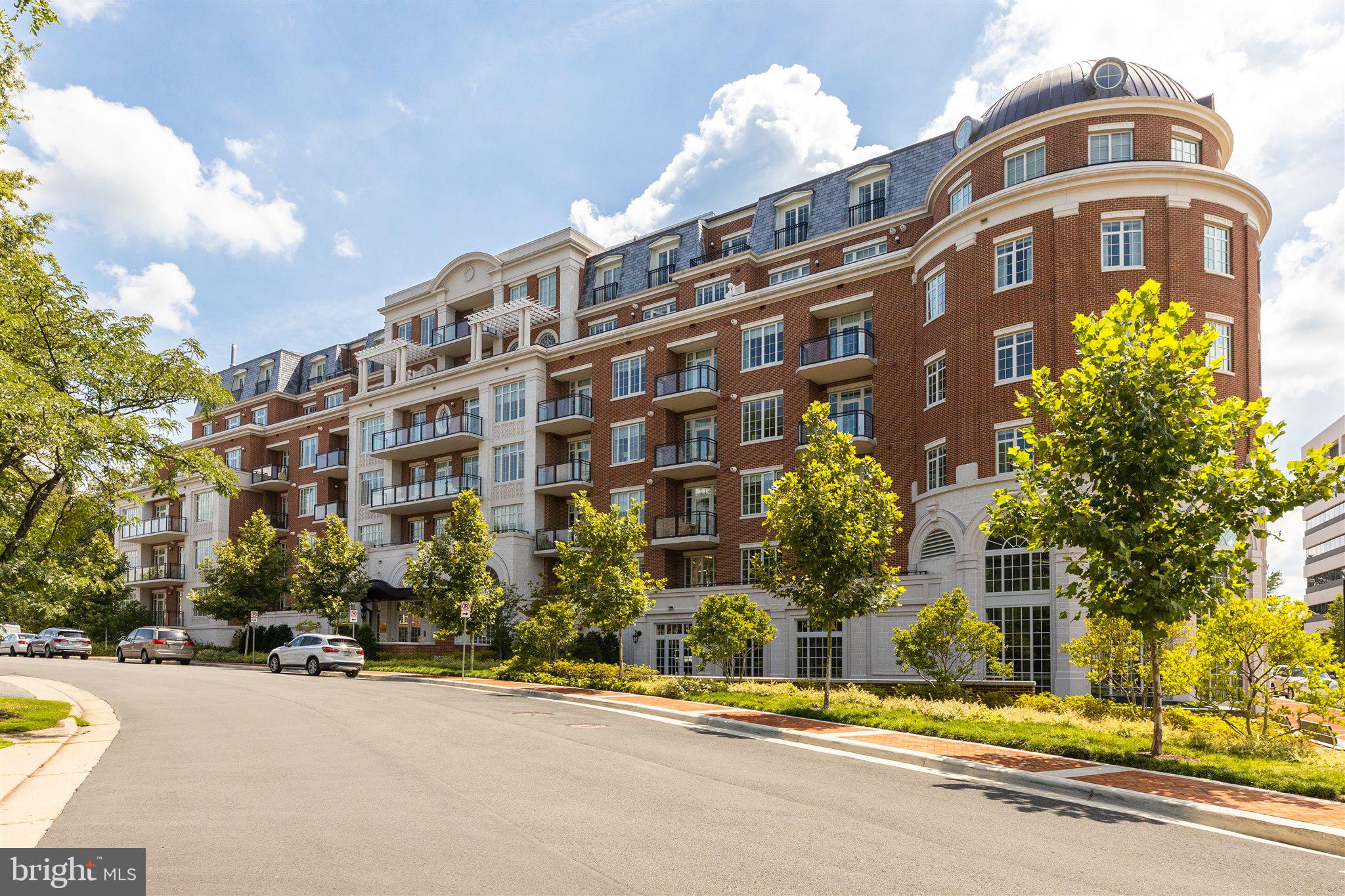 Welcome to 6900 Fleetwood Road, Unit 517 - a spacious and rare corner unit in the heart of McLean, VA with walls of windows and light yet plenty of wall space for your artwork. This home boasts over 1,902 square feet of living space, plus an additional 350-square-foot private terrace for outdoor enjoyment.
Situated on the 5th floor offering abundant daylight, exceptional privacy, and stunning views.  With easy elevator access to the 2 side-by-side parking spaces (288 and 290), convenience is a key feature of this residence.
The interior includes 2 bedrooms and 2.5 bathrooms, providing ample room for relaxation or work-from-home needs. 2 storage units offer plenty of space for all your belongings, ensuring a clutter-free environment.  Unit 517 is a perfect blend of privacy, sunshine, and scenic beauty, making it an ideal primary residence or a fantastic second home in the DMV area.
The Signet offers 24-hour concierge services and is ideally located between Tysons and Washington, DC. With Dulles International Airport and the Metro just minutes away, convenience is at your doorstep. The Signet is within walking distance of the library, community center, and McLean Park. Residents can enjoy socializing in the Club Room and secured courtyard, while the state-of-the-art gym and numerous activities, such as guest speakers, wine tastings, and card games, add to the vibrant community atmosphere.