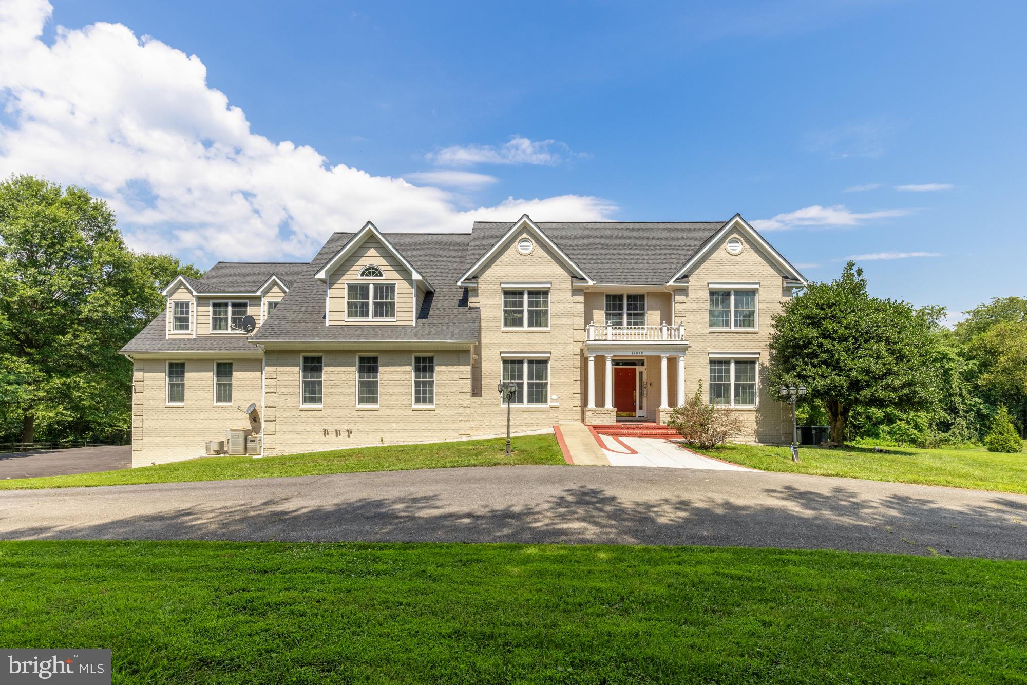 Welcome to 14840 Triadelphia Rd. – A Gracious Colonial Estate of Modern Sophistication. Classic charm meets contemporary refinement in this exquisite fully reimagined and updated 6-bedroom, 5 full and 2 half-bathroom residence, situated on nearly 3.5 acres of beautifully flat land. This private oasis offers the perfect balance of timeless architecture, thoughtful updates, and serene outdoor living—all located within one of Maryland’s most sought-after school districts.

Step inside to find a spacious main level adorned with rich hardwood flooring and sun-drenched living spaces. Oversized windows frame lush, green views, filling the home with natural light and warmth. At the heart of the home lies a fully renovated modern kitchen—a chef’s dream featuring top-tier appliances, quartz countertops, custom two-tone cabinetry, and a stunning center island ideal for both culinary artistry and casual entertaining.

All six bedrooms are generously sized and designed with comfort in mind. The expansive primary suite is a true sanctuary, boasting a newly renovated spa-inspired bathroom with high-end finishes, dual vanities, and a soaking tub. Additional bathrooms throughout the home are equally refined, showcasing premium materials and elegant, functional layouts. The finished basement offers flexible space for recreation, a home gym, or additional guest accommodations.

Outdoors, the possibilities are endless. The expansive lot provides ample space for a future pool, vibrant gardens, or outdoor retreats. Enjoy summer evenings on the oversized deck, perfect for al fresco dining and gatherings. An attached 3-car garage ensures abundant storage and off-street parking. Other notable improvements include 5 new HVAC systems.

Located just under an hour from Washington, D.C. and approximately half an hour from Baltimore and BWI airport, this property offers easy access to amenities while maintaining a peaceful, secluded feel. It’s also conveniently close to Dayton Oaks Elementary, Folly Quarter Middle, River Hill High, and other schools.

Don't miss the chance to own this extraordinary blend of luxury, comfort, and location. Schedule your private tour today of 14840 Triadelphia Rd.—a rare offering in one of Maryland’s most desirable communities.