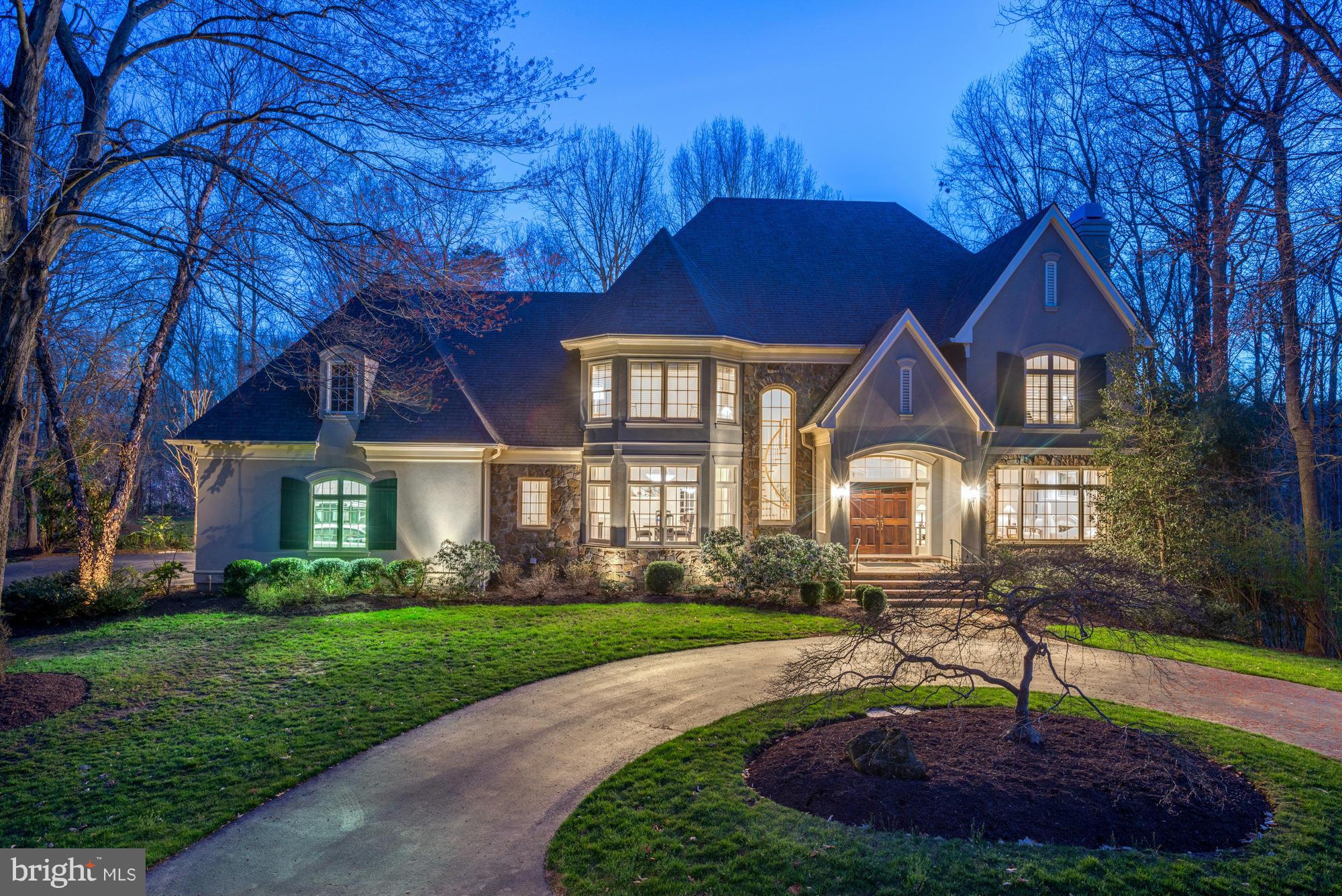 A Must See! Gorgeous Custom Home for an AMAZING Price! Stunning, sun-lit, custom home built by Michael Bowman features exceptional craftsmanship & attention to details. 6,700 sq. ft. on 3 levels on 1.96 acres backing to woods. Grand two-story foyer, side load 3 car garage, generator, patio with outdoor cooking area 5BR/4.55BA.  Fully Finished walk out lower level.Shows like a Model Home.