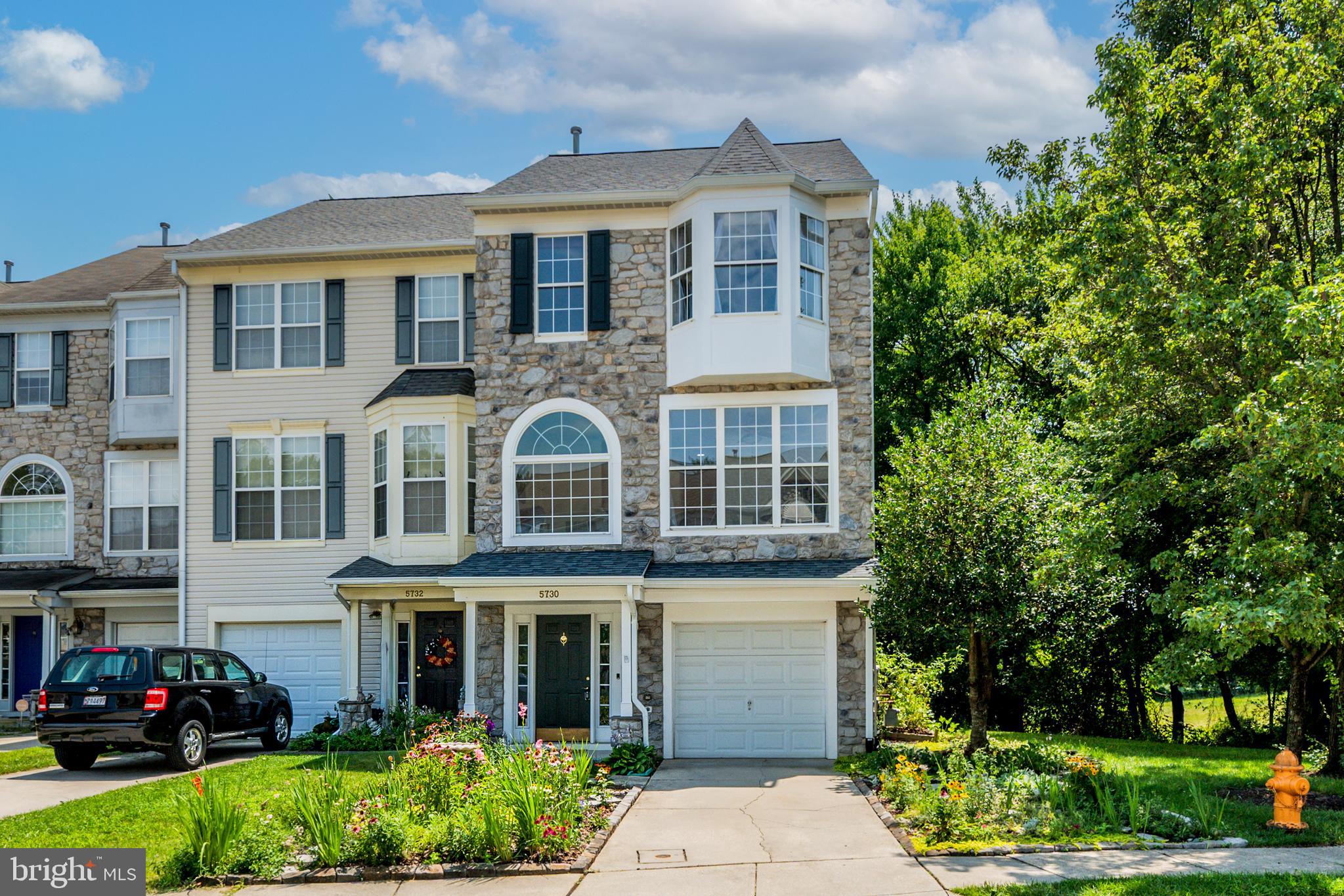 Welcome home to this beautifully maintained end-of-group garage townhome in desirable Montgomery Township, offering 3 bedrooms, 2 full baths, and 1 half bath. Featuring 9-foot ceilings, crown molding, with recessed lighting on all three levels, and an abundance of windows, this home is filled with natural light and designed for comfortable living. The bright and open floor plan is perfect for both everyday living and entertaining. The kitchen boasts 42-inch cabinetry, granite countertops, tile backsplash, and ample workspace, with easy access to the exterior deck overlooking the patio and garden below. The spacious lower-level recreation room offers flexibility and could easily serve as a fourth bedroom, home office, gym, or additional living space. Additional features include a convenient laundry chute and a recently replaced roof for added peace of mind. Ideally located close to shopping, dining, and entertainment at the Shoppes at Shipley's Grant, this home is also a commuter's dream with easy access to Route 100, Route 97, and the BW Parkway. Combining style, space, and convenience, this exceptional townhome is one you won't want to miss!