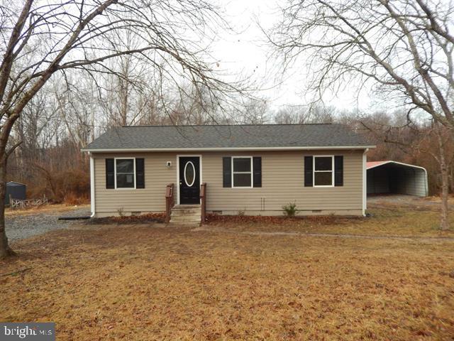 Ranch style home in Madison County VA. This home features 3 bedrooms, 1 bath, an eat-in kitchen, laundry closet, a storage building and a portable carport. The nearly level .65-acre lot makes for a great yard.