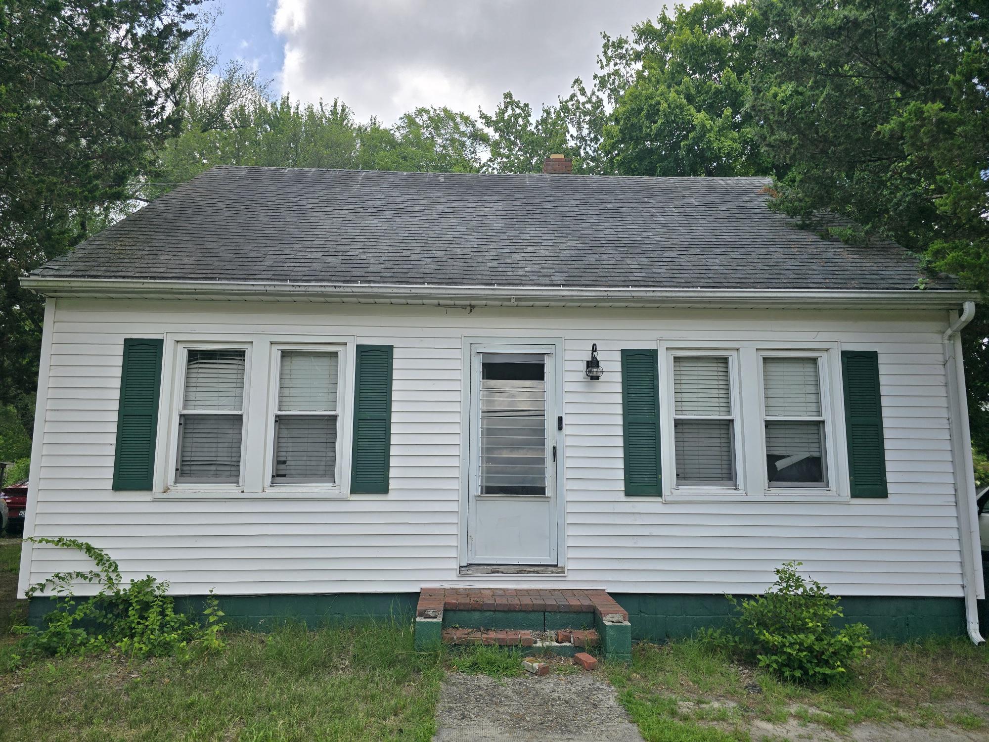 Built in the 1940s and full of potential, this 2-bedroom, 1-bath bungalow is ready for its next chapter. Situated on a desirable corner lot, this property presents an excellent opportunity for investors, flippers, or buyers looking to renovate and build equity. While the home requires significant updates and repairs, its classic bungalow charm and functional layout provide a solid foundation for restoration. With strong rental or resale potential, this is a chance to transform a fixer-upper into a valuable investment. Bring your vision and creativity—opportunities.  Property is being sold as-is.