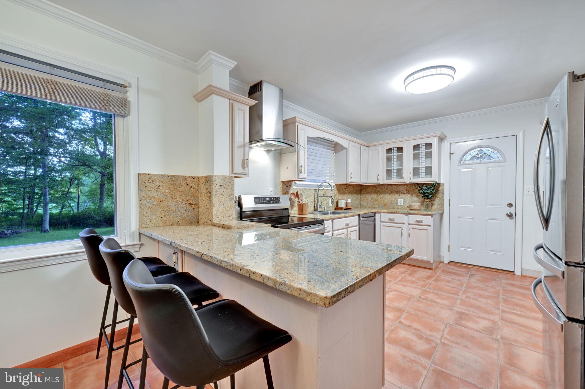 This beautifully maintained home offers the perfect blend of privacy, comfort, and character with spacious living areas, inviting outdoor space, and room to relax or entertain. Enjoy peaceful surroundings, a detached garage, ample parking, and a large yard ideal for gatherings, gardening, or simply enjoying the scenic setting. Conveniently located with easy access to commuter routes while still offering the tranquility of country living—this is the perfect place to call home!