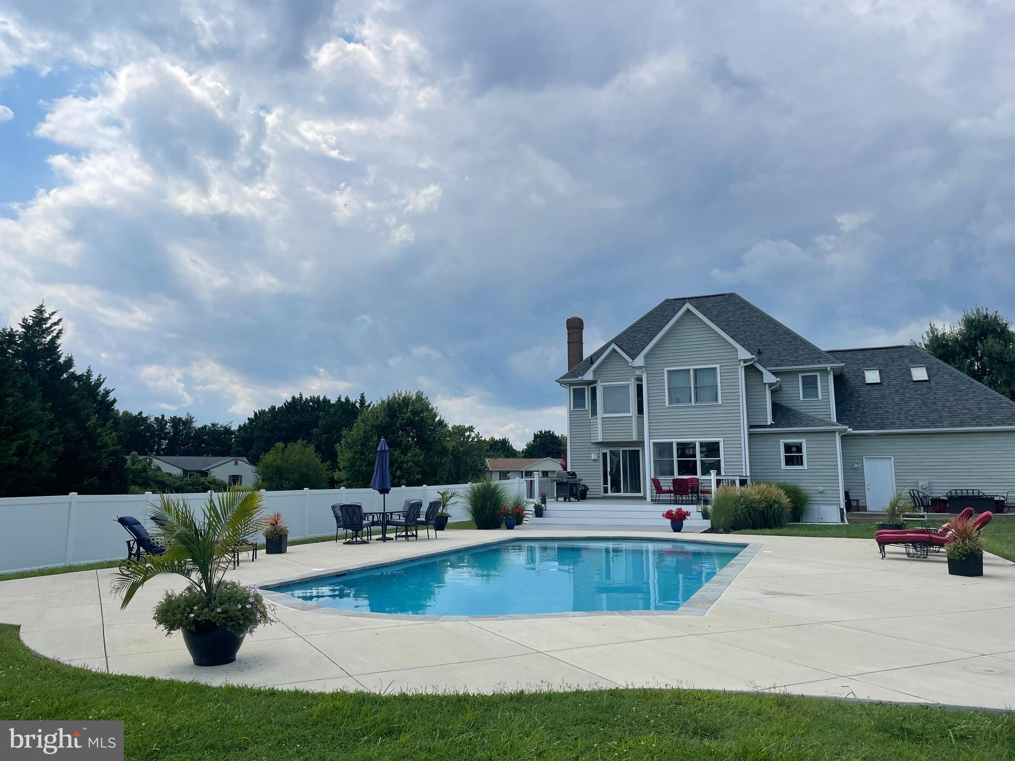 Welcome to this stunning home in the highly sought-after Claibornes Landing community! This beautifully maintained residence offers 4 spacious bedrooms and 2 newly remodeled bathrooms on the upper level, showcasing modern finishes and thoughtful design. Enjoy serene winter water views that add a touch of tranquility to your everyday living. Step outside to your own private oasis—an inviting in-ground pool surrounded by an expansive deck, perfect for entertaining guests or simply relaxing in the sun. Inside, the main level boasts a bright, eat-in kitchen with a generous dining area that flows seamlessly into a warm and welcoming family room complete with a cozy fireplace—ideal for gatherings and quiet evenings alike.The unfinished lower level provides a blank canvas for your imagination—create the perfect home gym, theater room, game space, or guest suite. The possibilities are endless! Don’t miss this opportunity to own a beautiful home in one of the area’s most desirable neighborhoods. Schedule your private tour today!