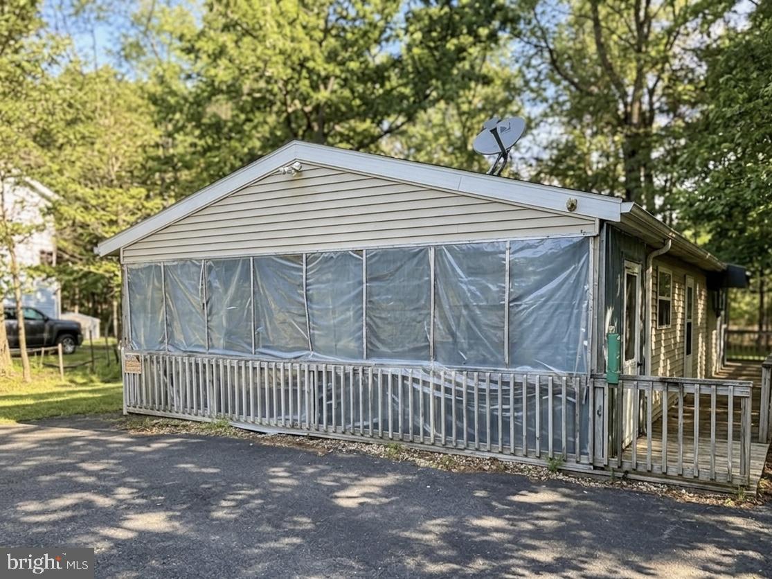 Welcome to 1841 Shadyside Road. This 3 bedroom home, 1 bathroom home has lots of potential with some TLC. Located within the gated Pocono Country Place community, this home features a private lot with plenty of off street parking. This property is walking distance to one of the community pools and Dresser Lake. If you’re looking for a second home, a long term rental property or a short term rental property, this property could be the one for you! The property is being sold AS-IS. Do not go to the property without an appointment.