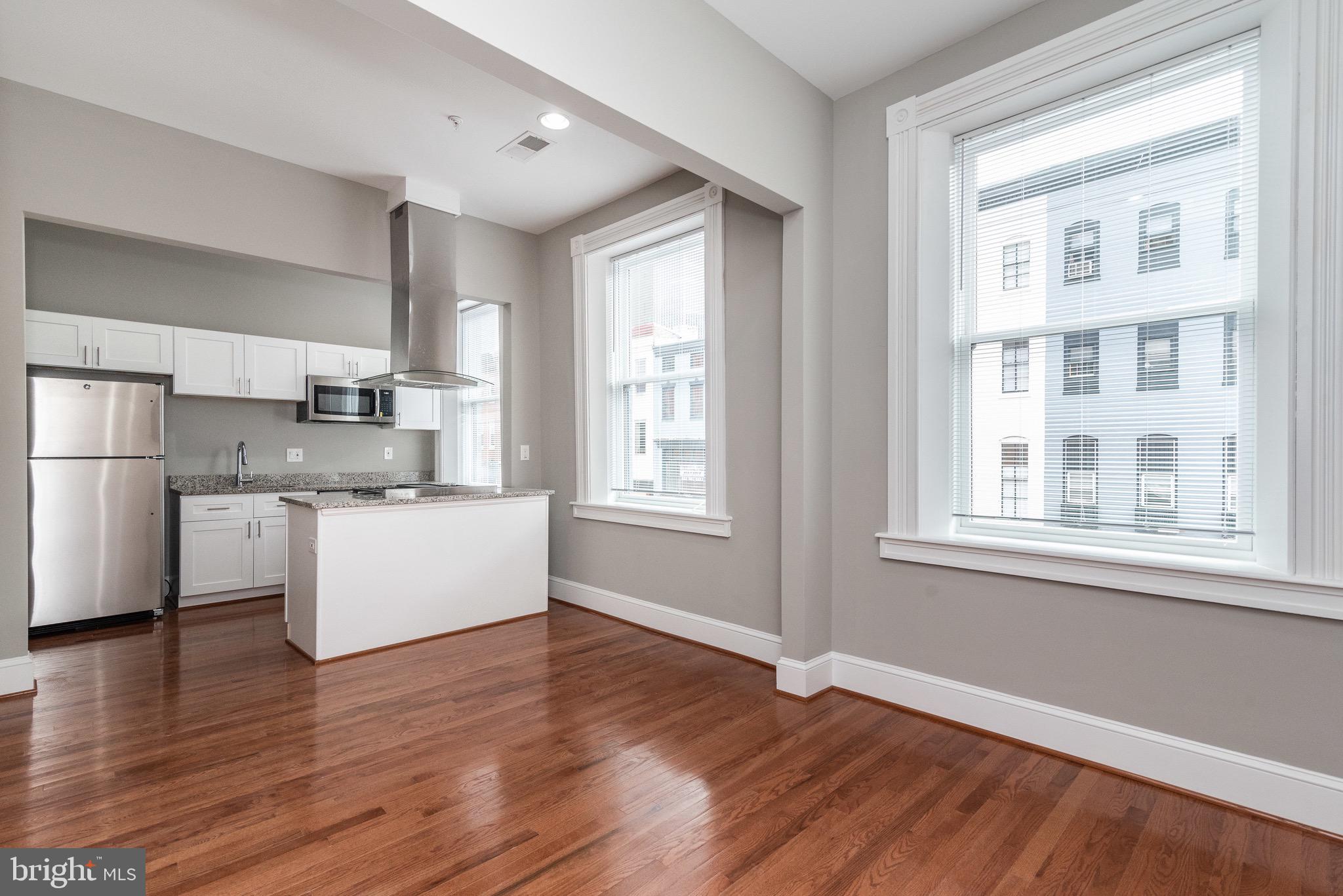 108 W. Saratoga features recently renovated apartments with all the amenities such as hardwood floors, high end bathroom finishes, granite counters, stainless steel appliances, washer dryers in the unit, central AC and more. The building is wired for cable/internet and ready for Comcast to hook you up. This apartment, Unit seven is a 2 bed 1 bath on the top floor overlooking Saratoga street. It has an abundance of natural light. There is one off street parking spot available for an extra $100 a month. Don't miss it!