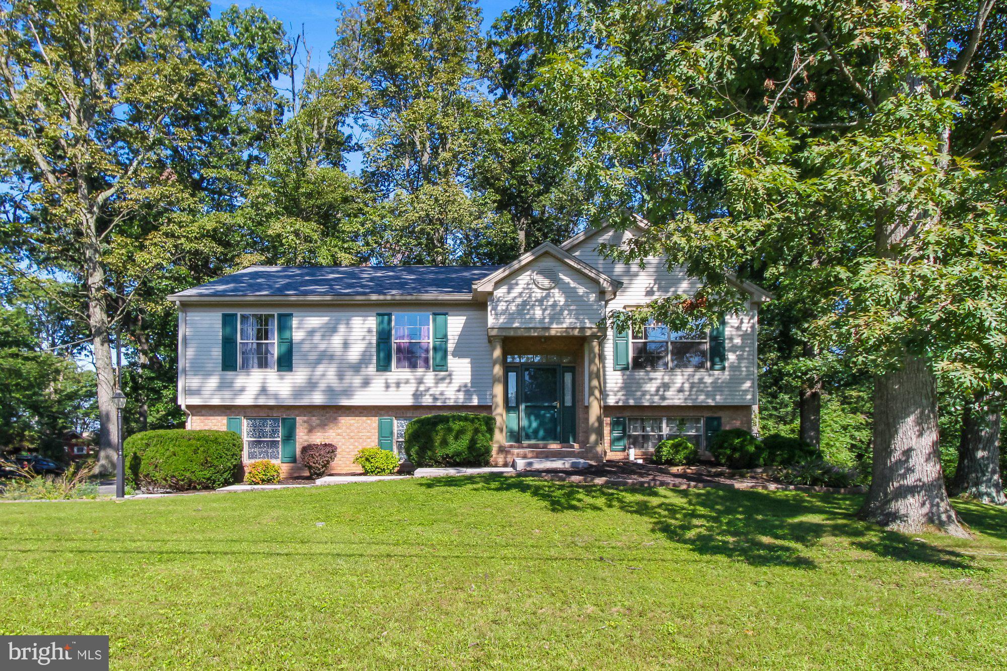 You will love this well maintained & tastefully appointed 3 BR, 2 BA home, just a stone's throw from Lake Williams, state & county parks, hospitals, colleges & major arteries! The home is situated on a corner lot, with the driveway fronting on a dead-end street, handy for evening walks to check out the sunset over the adjoining farmland! Hardwood floors in the foyer lead to an open layout featuring vaulted ceilings, architectural columns, neutral color palette, large kitchen with breakfast bar, pantry & lots of cabinet/counter space, separate dining & a wonderful Sun room with staircase to the shaded backyard. Three accommodating bedrooms include nice owner's suite with private bath including new step in shower.  The laundry area is on the main level for optimal convenience. The finished lower level offers large rec room & slider to back patio, great for entertaining or for a home office! Oversized 2-car garage  offers tons of additional storage and workshop space,  and paved drive provides plenty of parking. With a wonderful setting, easy commute & so many local activities nearby, this is more than a home, it's a lifestyle!  All appliances and one year home warranty included.