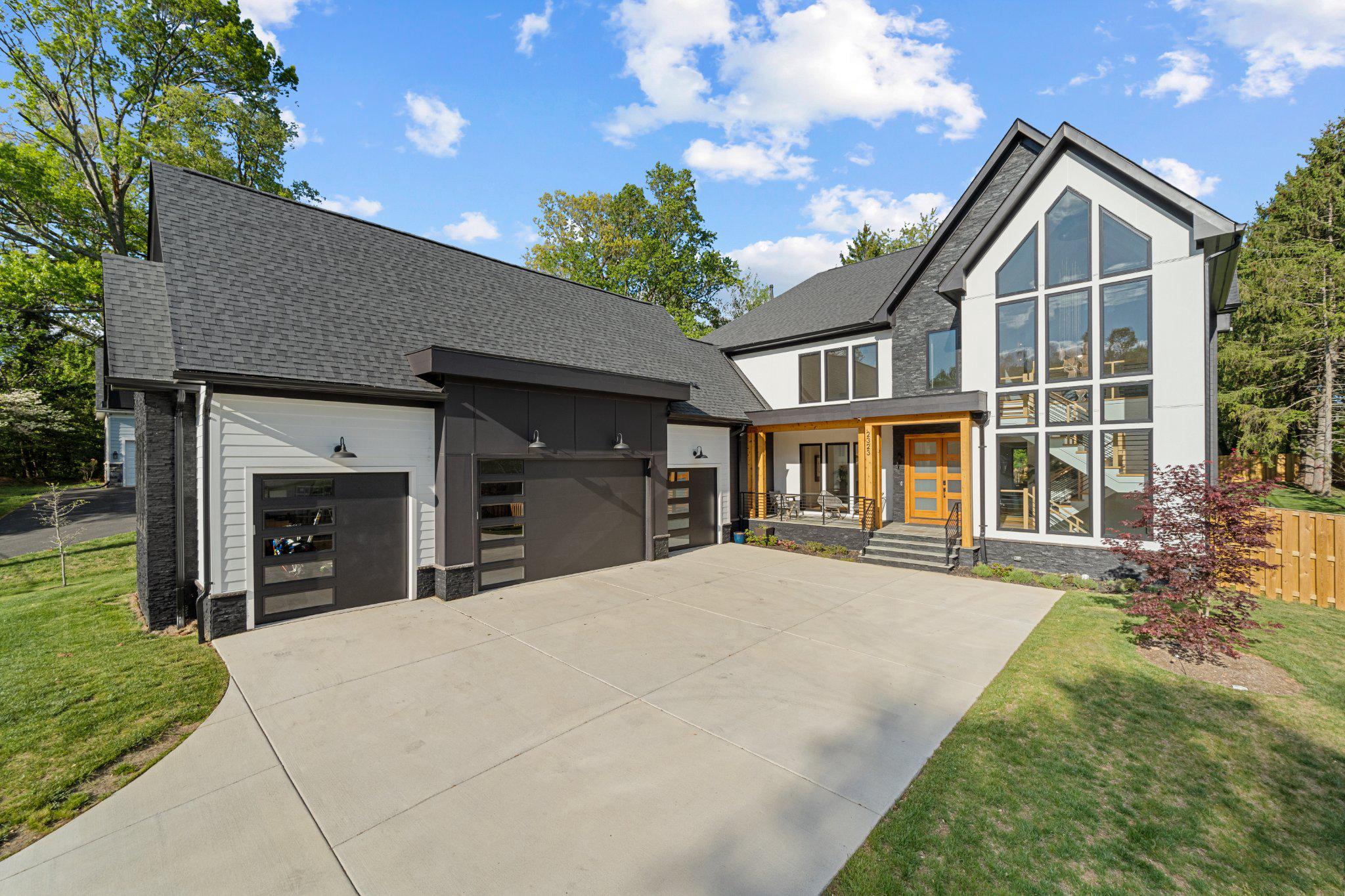 Step into unparalleled luxury at 2323 Stryker Ave in Vienna, Virginia.This home is not your ordinary new build—this is a masterpiece crafted that combines modern sophistication, timeless design, and premium upgrades that redefine luxury living. Nestled on a serene half-acre in Fairfax County and boasting 8,496 square feet across three levels, this Modern Craftsman isn’t just a home; it’s an experience.

The heart of this home is the gourmet kitchen, a culinary dream with an oversized island, premium appliances, and a separate prep kitchen —ideal for hosting anything from intimate dinners to lively gatherings. Recent upgrades include cutting-edge 2026 Miele appliances: a built-in smart coffee/espresso machine, dual dishwashers, and a steam combi oven. Bar areas on the main and lower levels are equipped with dishwashers. An instant hot water system by Kitchen-Aid adds even more convenience. The main level’s 10-foot ceilings, intricate ceiling designs, and rich Red Oak flooring create an inviting, open ambiance, while features like a private bedroom suite, cozy breakfast nook, and family room opening to a covered flagstone patio seamlessly blend indoor and outdoor living. There’s even an elevator shaft in place for future possibilities.

Upstairs, discover a flexible loft space and four oversized bedrooms, each with walk-in closets and en-suite baths. The primary suite is a true retreat, featuring soaring 20-foot vaulted ceilings, a double-sided gas fireplace, a spa-like bath with a steam shower, and custom his-and-hers walk-in closets. The second floor also includes a dedicated laundry room.

The lower level is an entertainer’s paradise, complete with 9-foot ceilings, a sprawling recreation room with a grand wet bar, a state-of-the-art gym, and a theater room prepped for a golf simulator. A private in-law suite with a full bath ensures guest comfort, while advanced home technology elevates the living experience. 

Every corner of this home showcases impeccable craftsmanship and attention to detail. Far from being just another new construction, this home has been enhanced with carefully chosen upgrades that make it entirely move-in ready. Don’t let this opportunity slip by—your dream home is waiting!