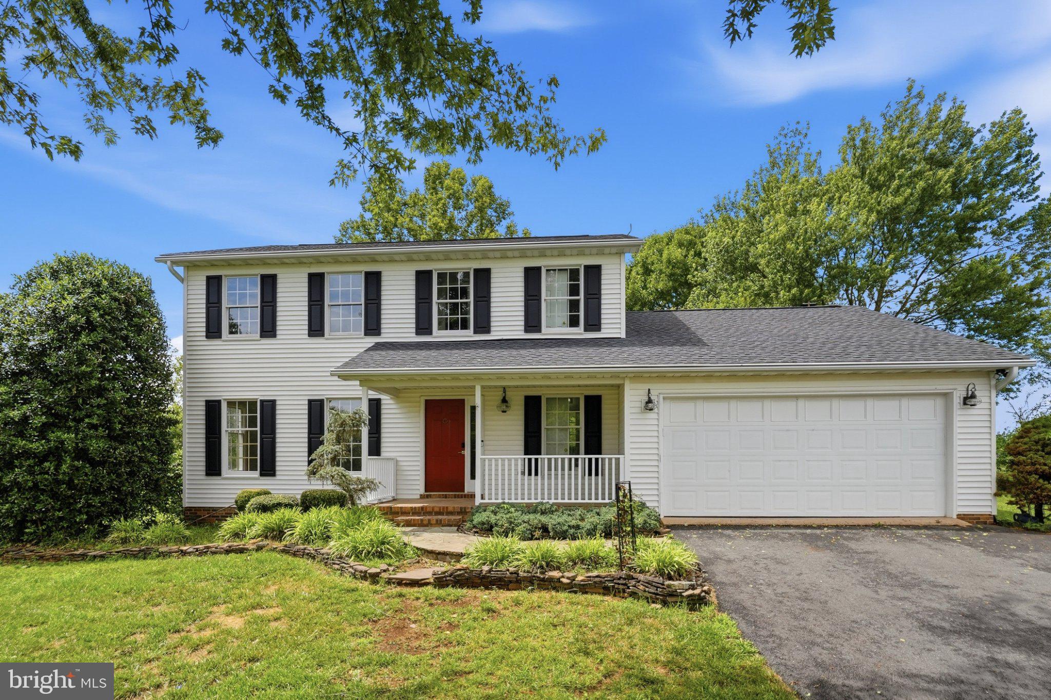 Move-in Ready! This charming Colonial-style home, situated on 1.34 acres, offers a perfect blend of classic elegance and modern comfort. With 2,001 square feet of thoughtfully designed living space, this residence is ideal for those seeking a warm and inviting atmosphere. Step inside to discover a traditional floor plan that seamlessly connects the family room to the kitchen, creating an inviting space for gatherings and everyday living. The family room features a cozy wood-burning fireplace, adorned with a classic brick surround, perfect for chilly evenings. Natural light pours in through the windows, enhancing the warmth of the hardwood floors that flow throughout the main level. The kitchen is a culinary delight, equipped with upgraded countertops and a convenient breakfast area, making it easy to enjoy casual meals or morning coffee. The built-in appliances, including a wall oven and cooktop, cater to your cooking needs, while the refrigerator and icemaker ensure you're always stocked up for entertaining. Upstairs, you'll find three spacious bedrooms, all with updated LVP flooring, including a primary suite that boasts an en-suite bathroom with a tub shower, providing a private retreat for relaxation. Additional features include a versatile attic space for extra storage, a convenient laundry area with a washer and dryer, and a half bath for guests. The home's thoughtful design extends outdoors, where you can unwind on the deck or porch, perfect for enjoying warm summer evenings or morning sunrises. Parking is a breeze with an attached side-entry garage that accommodates two vehicles, along with ample driveway space for guests. The property also includes a shed for additional storage needs and a whole house generator. Located in a peaceful neighborhood, this home offers a sense of community while being just a short drive from local amenities. Whether you're looking for a place to create lasting memories or a comfortable retreat to call your own, this residence is ready to welcome you home. Don't miss the opportunity to make this charming Colonial yours!