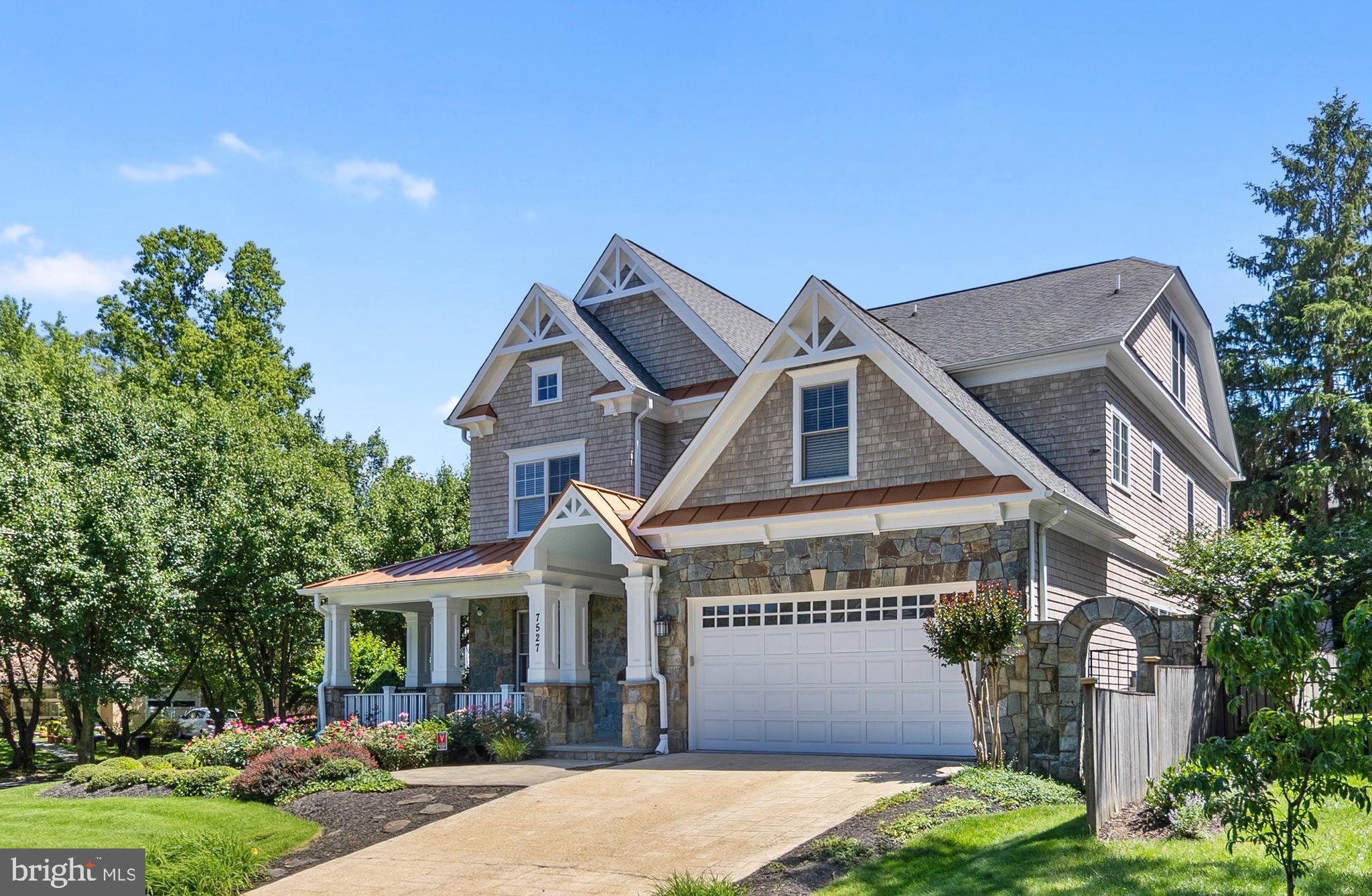 Welcome  7527 Westfield Drive, an exquisitely maintained home on a corner lot in the coveted Landon Woods neighborhood.  This 8 bedroom, 5 1/2 bath residence offers four levels of timeless elegance filled with natural light and functional spaces perfect for everyday living and entertaining. The home features 10' and 9’ ceilings with Brazilian Cherry hardwood floors throughout, stunning decorative trim and window casings and tray and coffered ceilings. The main level boasts a living room, dining room, family room w/fireplace, office and mudroom. The gourmet kitchen features a large center island, sunny breakfast area, walk-in pantry and direct access from the family room to a large screened porch.  Outside a stone patio overlooks the fully fenced beautifully landscaped back yard. Upstairs, the owner’s Suite has a lit tray ceiling with two walk-in closets, and en-suite spa-like bath with two vanities, a separate large steam shower and jetted tub and separate water closet. Three additional bedrooms, one with an en suite bath and a shared bath between the two other bedrooms and a laundry room complete this level.  The third level has two bedrooms, a large sitting area and full bath. All bedrooms have spacious closets and are generously sized. The fully finished walkout lower level features a generous recreation room with stone gas fireplace and built-ins, a theater room with big screen and projector, sitting area and a large storage area and utility space in the basement. There are two bedrooms, one with walk in closet, the other with full wall closet for ample storage space. This home is equipped with a whole house generator and two zoned HVAC, each around 1–2 years old and a new hot water heater.  All smoke detectors are new and the  home has been completely painted and is ready for immediate occupancy. Located  in a top rated school district with convenient to downtown Bethesda with easy access to the metro, 495, Reagan National and Dulles Airports. You don’t want to miss this!